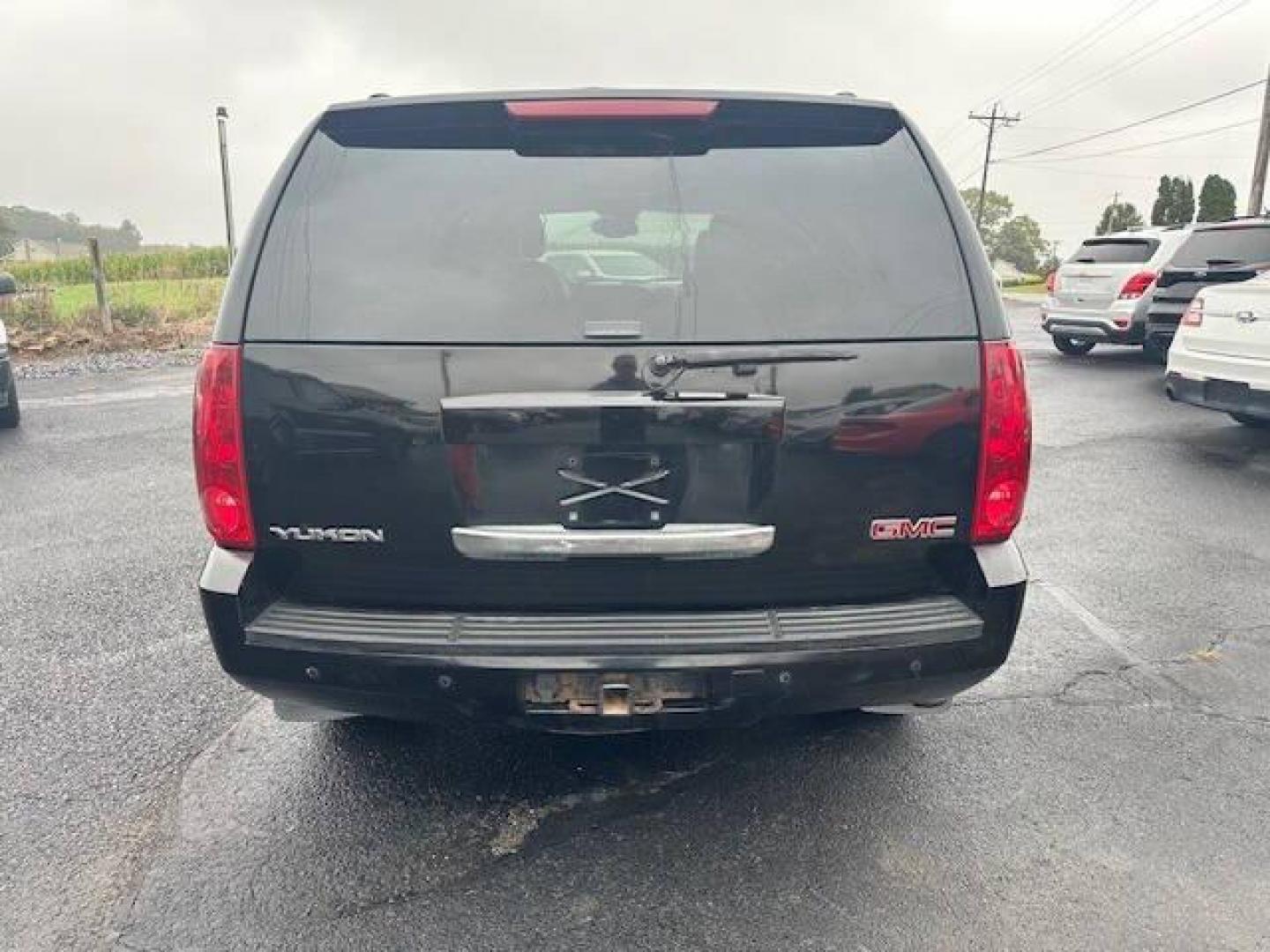 2007 Black GMC Yukon (1GKFK13077R) with an 5.3L V8 5.3L V8 engine, located at 4845 Woodbury Pike, Roaring Springs, PA, (814) 317-5008, (814) 317-5008, 40.250935, -78.366959 - 2007 GMC YUKON 5.3 LITER ENGINE AUTOMATIC TRANSMISSION, POWER WINDOWS AND SEATS HEATED SEATS 3RD ROW SEATS REAR DVD PLAYER GOOD TIRES AND BRAKES. RUN AND DRIVE GREAT. IF INTERRESTED PLEASE STOP BY OR GIVE US A CALL 814-317-5008 - Photo#2