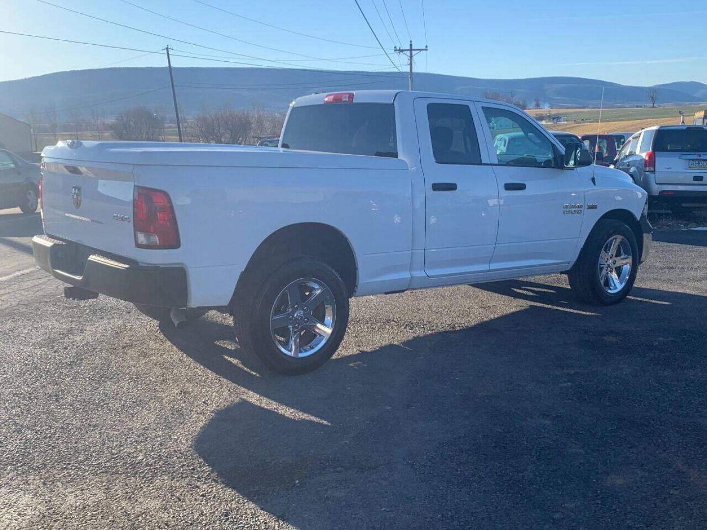 2014 White RAM 1500 (1C6RR7FT8ES) with an 5.7L V8 5.7L V8 engine, located at 4845 Woodbury Pike, Roaring Springs, PA, (814) 317-5008, (814) 317-5008, 40.250935, -78.366959 - 2014 Dodge Ram 1500, automatic, 160k, V8, 5.7 Hemi, power windows/locks, cruise/tilt wheel, air conditioning, rear back up camera, painted hard tonneau cover, 20 chrome wheels and more. Truck has new inspection, new brakes/rotors. To see a full list of this vehicles options visit smithfamilycarstor - Photo#2