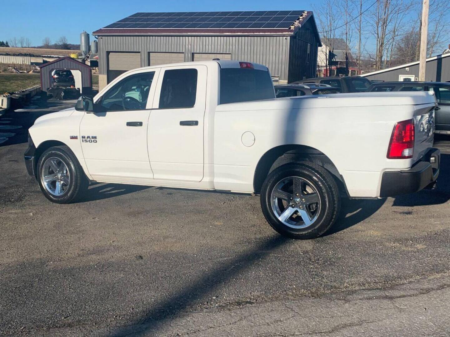 2014 White RAM 1500 (1C6RR7FT8ES) with an 5.7L V8 5.7L V8 engine, located at 4845 Woodbury Pike, Roaring Springs, PA, (814) 317-5008, (814) 317-5008, 40.250935, -78.366959 - 2014 Dodge Ram 1500, automatic, 160k, V8, 5.7 Hemi, power windows/locks, cruise/tilt wheel, air conditioning, rear back up camera, painted hard tonneau cover, 20 chrome wheels and more. Truck has new inspection, new brakes/rotors. To see a full list of this vehicles options visit smithfamilycarstor - Photo#3