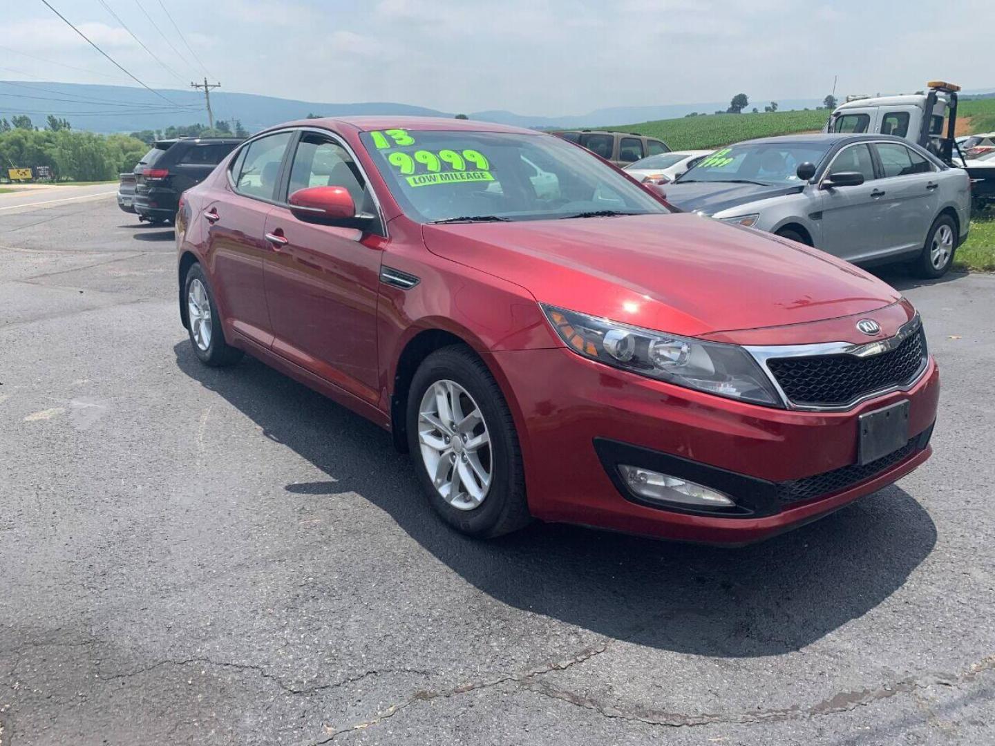 2013 Burgundy Kia Optima (5XXGM4A78DG) with an 2.4L I4 2.4L I4 engine, located at 4845 Woodbury Pike, Roaring Springs, PA, (814) 317-5008, (814) 317-5008, 40.250935, -78.366959 - Photo#0