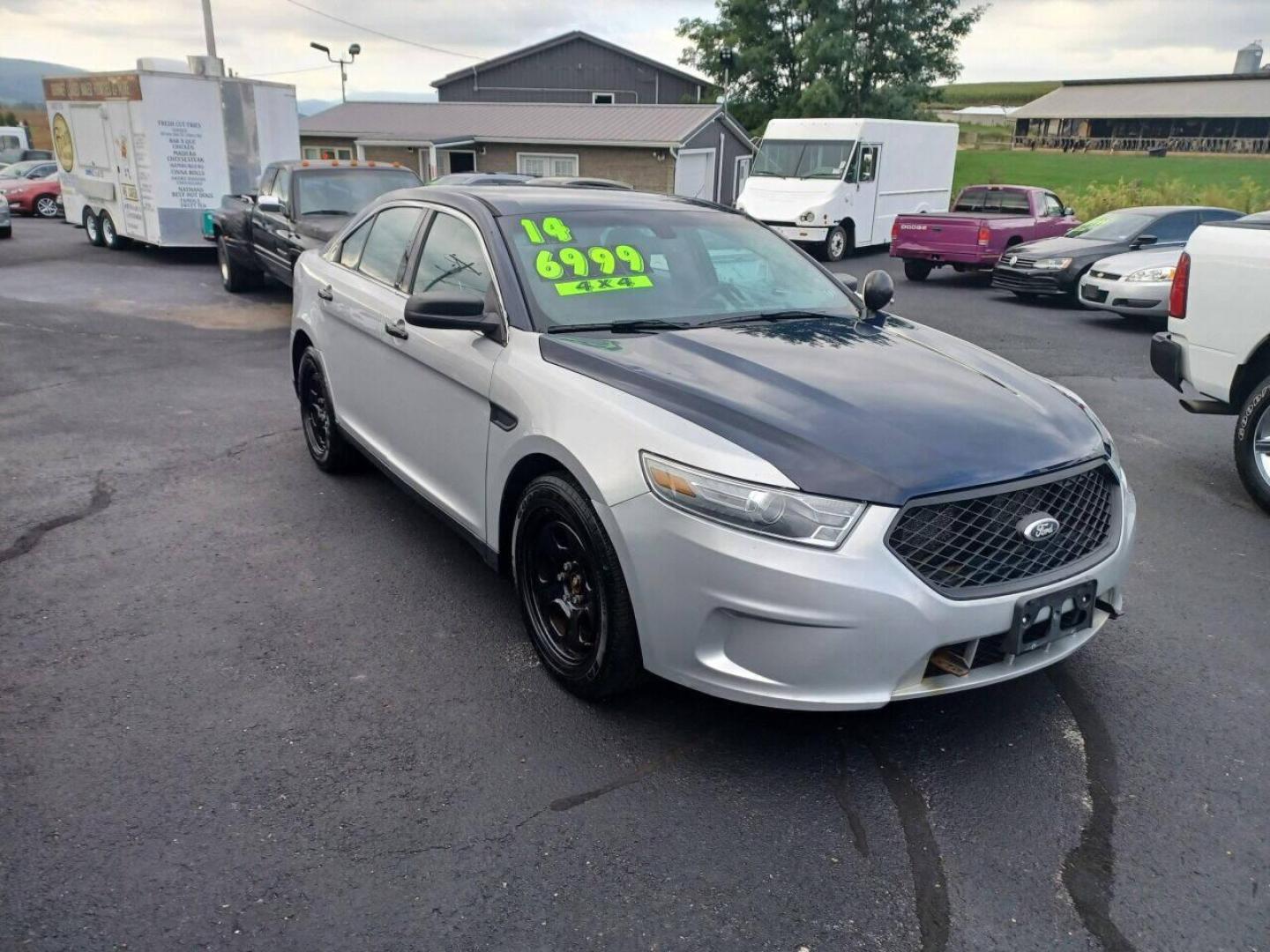 2014 Other Ford Taurus (1FAHP2MK4EG) with an 3.7L V6 3.7L V6 engine, located at 4845 Woodbury Pike, Roaring Springs, PA, (814) 317-5008, (814) 317-5008, 40.250935, -78.366959 - 2014 Ford Taurus Police Sedan, AWD, 153k, 3.7L, V6, power windows/locks, cruise/tilt wheel, air conditioning, steering controls, rear back up, well maintained, new inspection and more. Southern retired government vehicle. To see a full list of this vehicles options visit smithfamilycarstore.com. - Photo#0