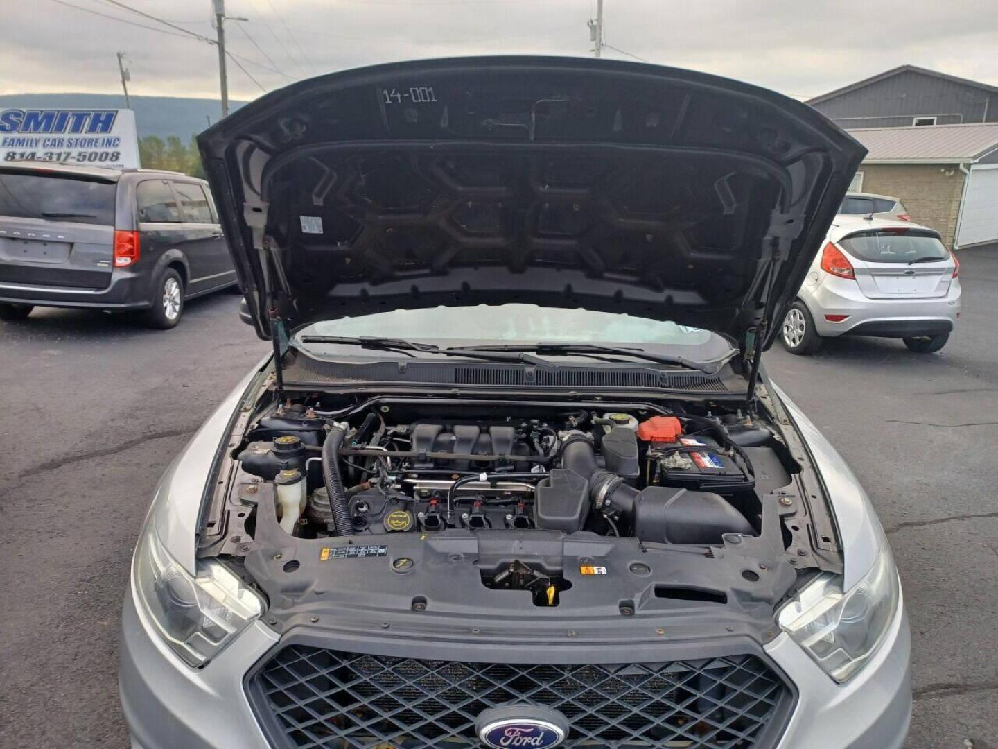 2014 Other Ford Taurus (1FAHP2MK4EG) with an 3.7L V6 3.7L V6 engine, located at 4845 Woodbury Pike, Roaring Springs, PA, (814) 317-5008, (814) 317-5008, 40.250935, -78.366959 - 2014 Ford Taurus Police Sedan, AWD, 153k, 3.7L, V6, power windows/locks, cruise/tilt wheel, air conditioning, steering controls, rear back up, well maintained, new inspection and more. Southern retired government vehicle. To see a full list of this vehicles options visit smithfamilycarstore.com. - Photo#12