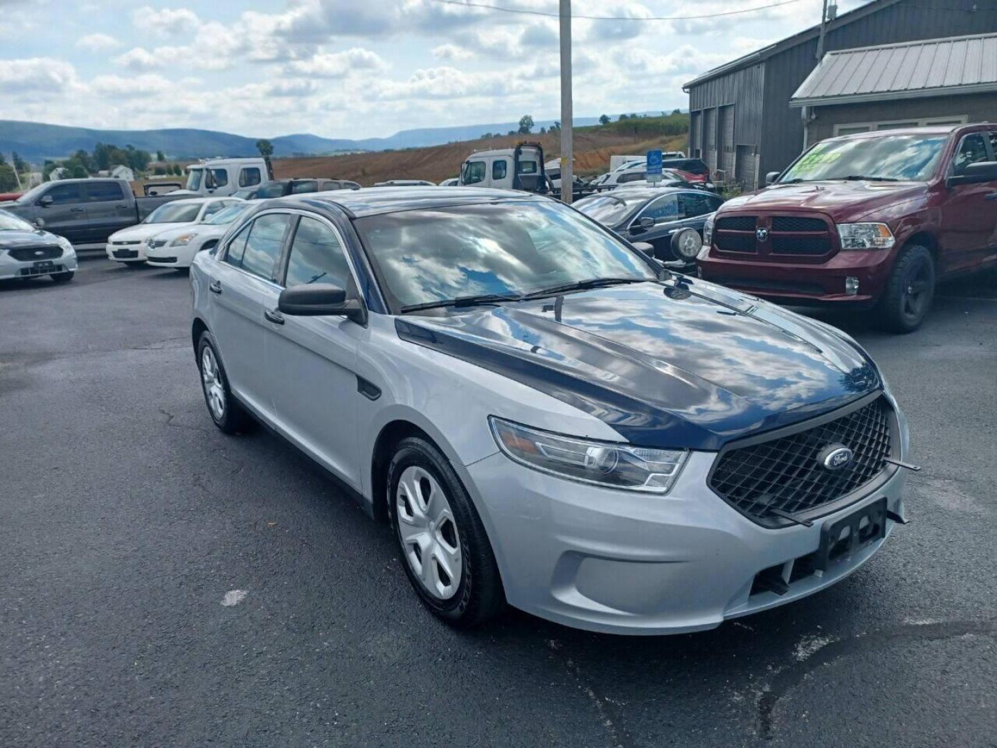 2014 Other Ford Taurus (1FAHP2MK9EG) with an 3.7L V6 3.7L V6 engine, located at 4845 Woodbury Pike, Roaring Springs, PA, (814) 317-5008, (814) 317-5008, 40.250935, -78.366959 - Photo#1