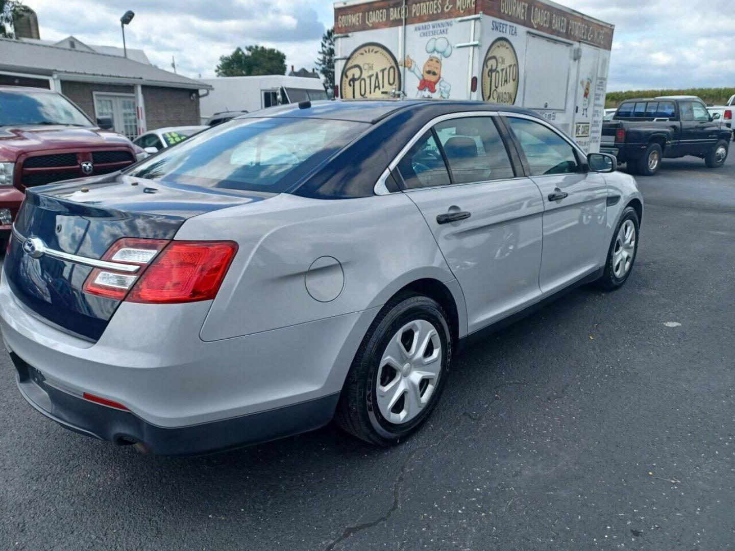 2014 Other Ford Taurus (1FAHP2MK9EG) with an 3.7L V6 3.7L V6 engine, located at 4845 Woodbury Pike, Roaring Springs, PA, (814) 317-5008, (814) 317-5008, 40.250935, -78.366959 - Photo#2