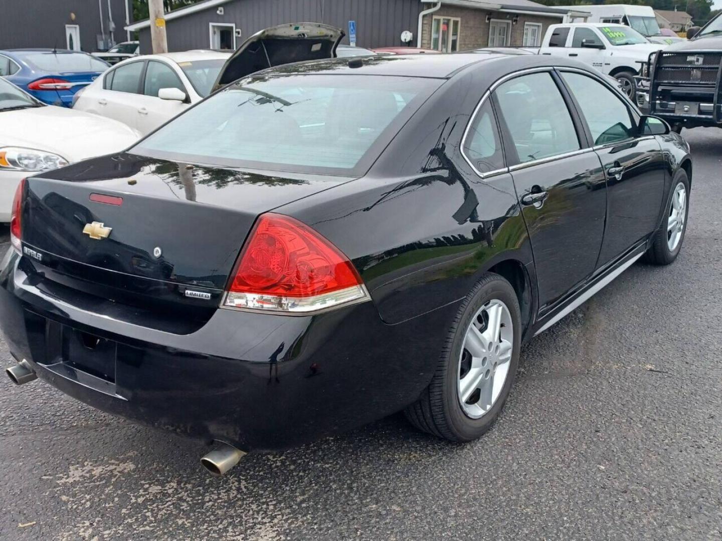 2016 Black Chevrolet Impala Limited (2G1WD5E35G1) with an 3.6L V6 3.6L V6 engine, located at 4845 Woodbury Pike, Roaring Springs, PA, (814) 317-5008, (814) 317-5008, 40.250935, -78.366959 - 2016 Chevy Impala, automatic, 143k, FWD, power windows/locks, cruise/tilt wheel, air conditioning, new inspection, new tires. Flex fuel! Southern vehicle! Well maintained! Clean! Will come with a 3 month/4500 mile power train warranty with the option to upgrade. To see a full list of this vehicle - Photo#2