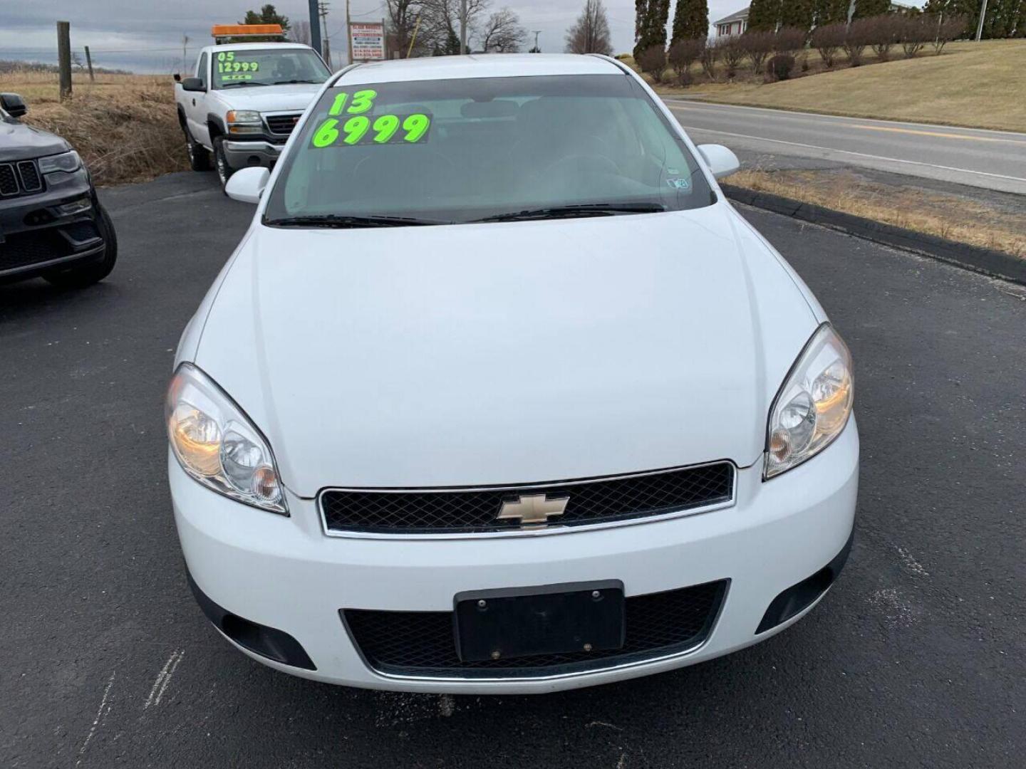 2013 White Chevrolet Impala (2G1WD5E30D1) with an 3.6L V6 3.6L V6 engine, located at 4845 Woodbury Pike, Roaring Springs, PA, (814) 317-5008, (814) 317-5008, 40.250935, -78.366959 - Photo#0