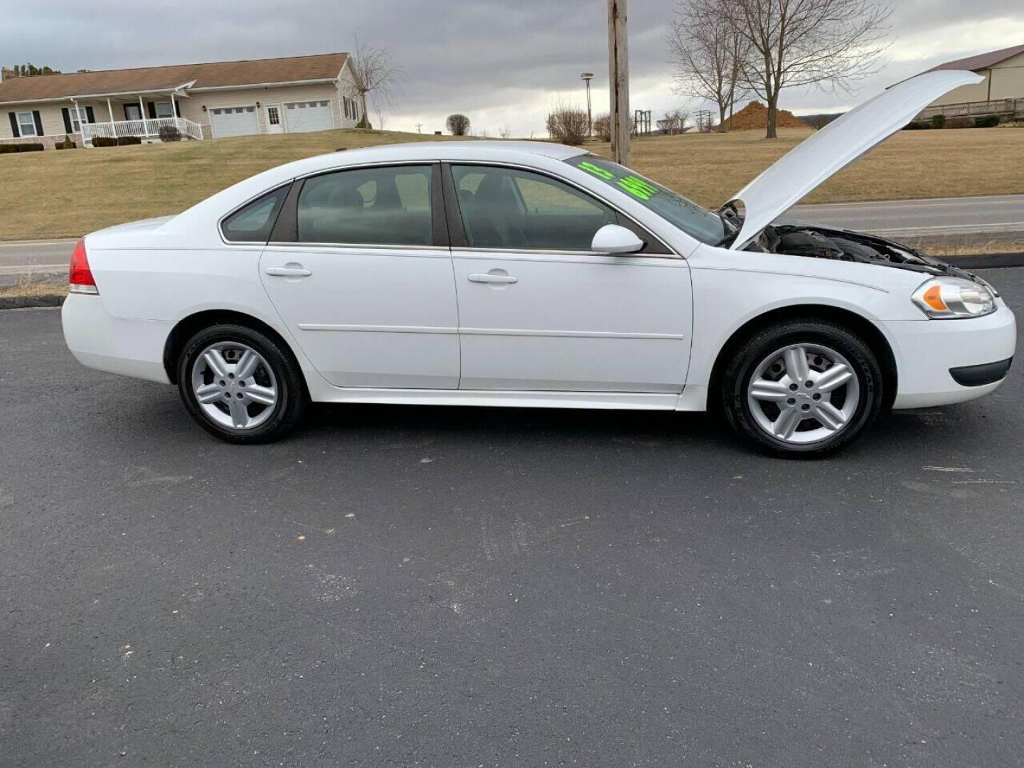 2013 White Chevrolet Impala (2G1WD5E30D1) with an 3.6L V6 3.6L V6 engine, located at 4845 Woodbury Pike, Roaring Springs, PA, (814) 317-5008, (814) 317-5008, 40.250935, -78.366959 - Photo#3