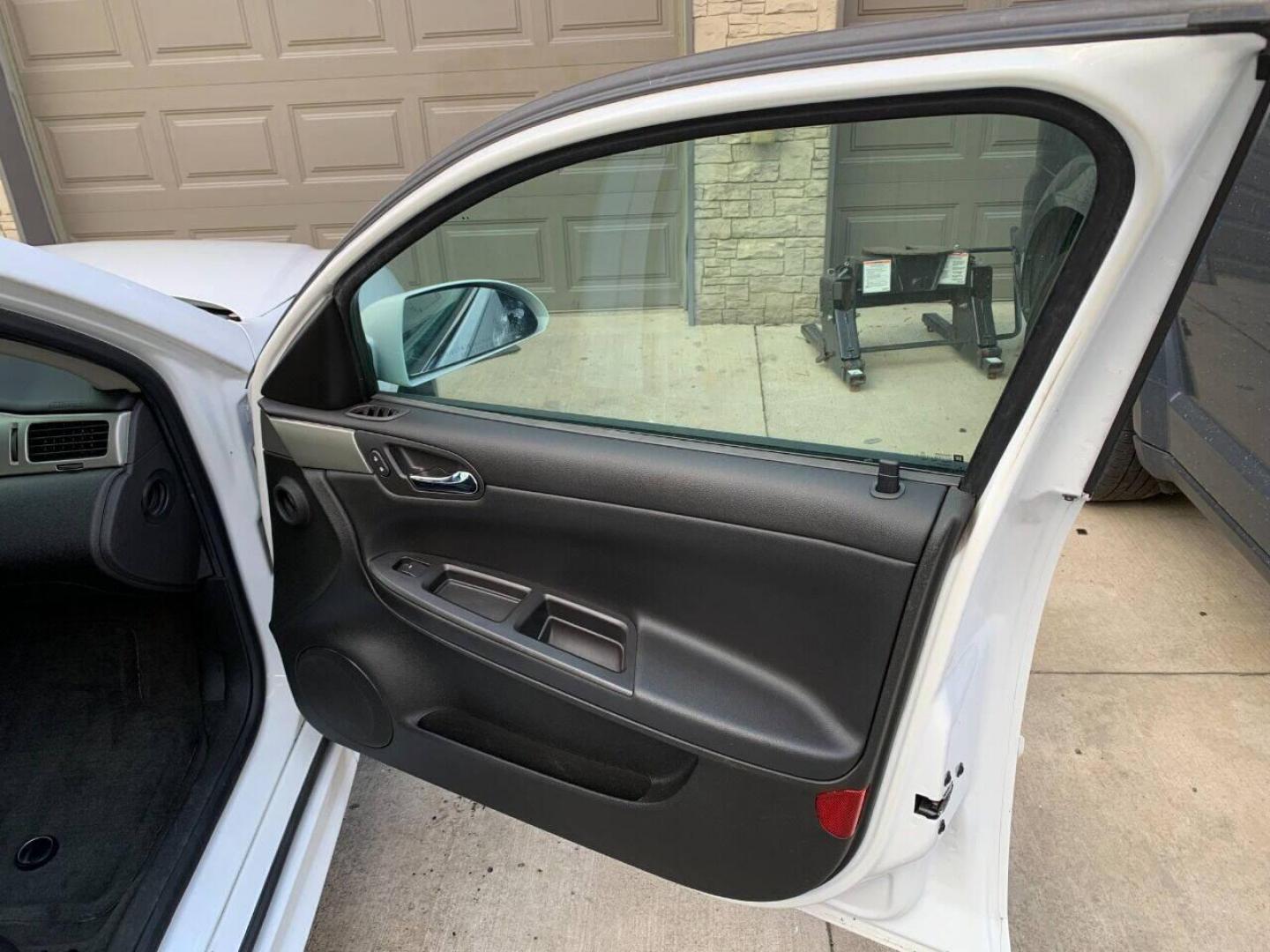 2013 White Chevrolet Impala (2G1WD5E30D1) with an 3.6L V6 3.6L V6 engine, located at 4845 Woodbury Pike, Roaring Springs, PA, (814) 317-5008, (814) 317-5008, 40.250935, -78.366959 - Photo#4