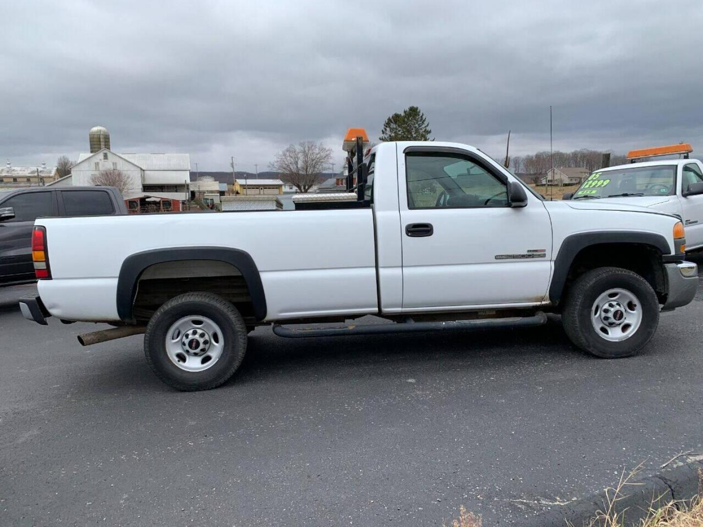 2005 White GMC Sierra 2500HD (1GTHC24265E) with an 6.6L V8 Turbocharger 6.6L V8 engine, located at 4845 Woodbury Pike, Roaring Springs, PA, (814) 317-5008, (814) 317-5008, 40.250935, -78.366959 - 1 owner, Virginia State owned! Very well maintained! 2005 Chevy Sierra 2500 HD, 6.6 Diesel, automatic, 4x2, like new tires, new inspection, warranty available, vinyl, 183k, RWD, comes with 2 toolboxes. No rust repair was ever done to this truck! Rust free undercarriage! Must see condition! To se - Photo#7