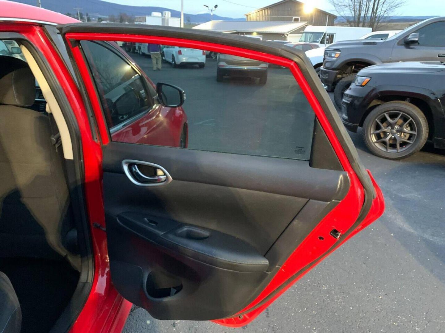 2017 Red Nissan Sentra (3N1CB7AP7HY) with an 1.6L I4 Turbocharger 1.6L I4 engine, located at 4845 Woodbury Pike, Roaring Springs, PA, (814) 317-5008, (814) 317-5008, 40.250935, -78.366959 - 2017 Nissan Sentra SR, Turbo edition, 6 speed, 82k, 18 inch wheels, rear back up camera, roof and much more. Super clean! Southern vehicle! Low miles! Vehicle is in Must See Condition! New inspection! To see a full list of this vehicles options visit smithfamilycarstore.com. If interested, please ca - Photo#10