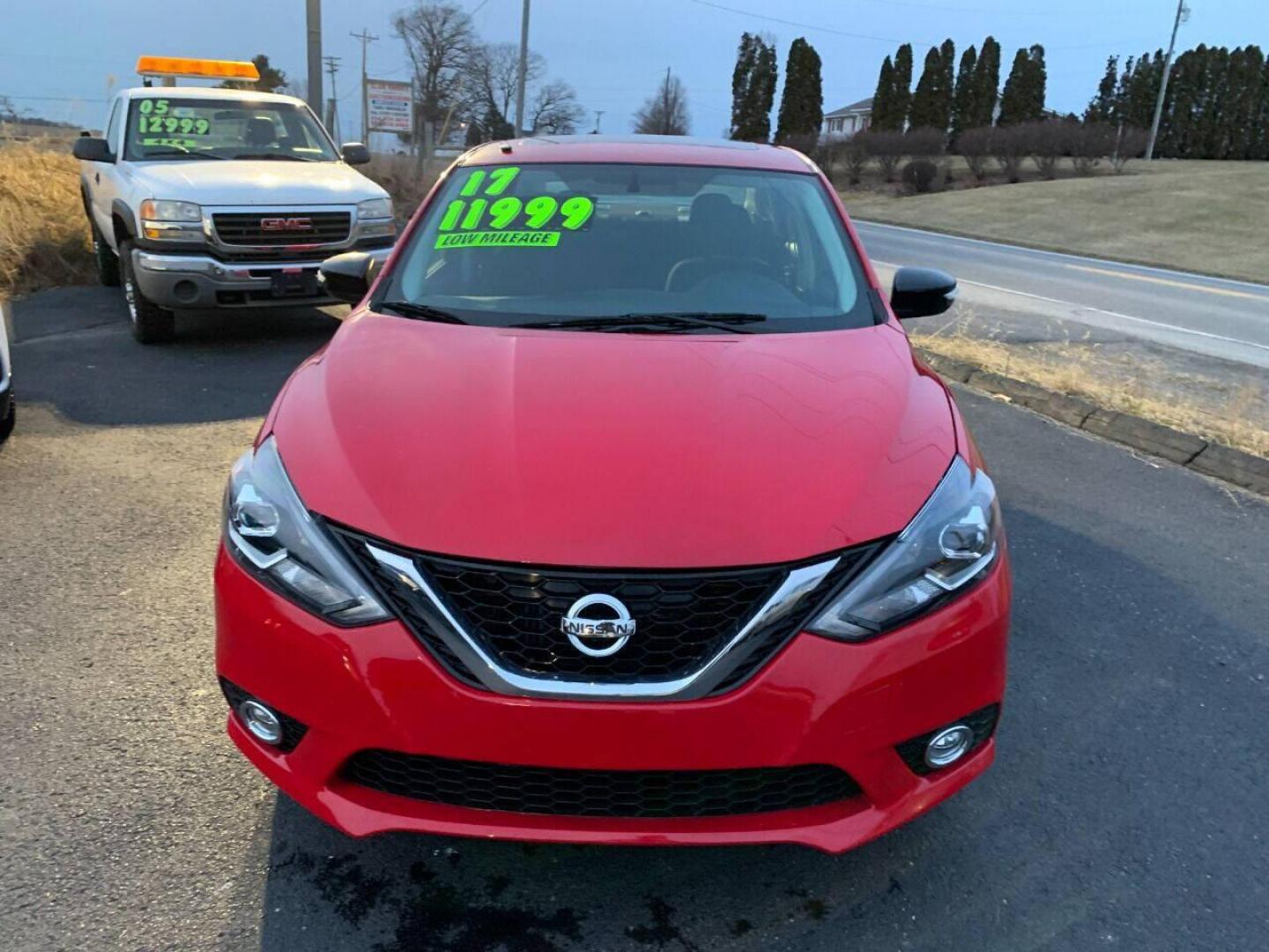 2017 Red Nissan Sentra (3N1CB7AP7HY) with an 1.6L I4 Turbocharger 1.6L I4 engine, located at 4845 Woodbury Pike, Roaring Springs, PA, (814) 317-5008, (814) 317-5008, 40.250935, -78.366959 - 2017 Nissan Sentra SR, Turbo edition, 6 speed, 82k, 18 inch wheels, rear back up camera, roof and much more. Super clean! Southern vehicle! Low miles! Vehicle is in Must See Condition! New inspection! To see a full list of this vehicles options visit smithfamilycarstore.com. If interested, please ca - Photo#2