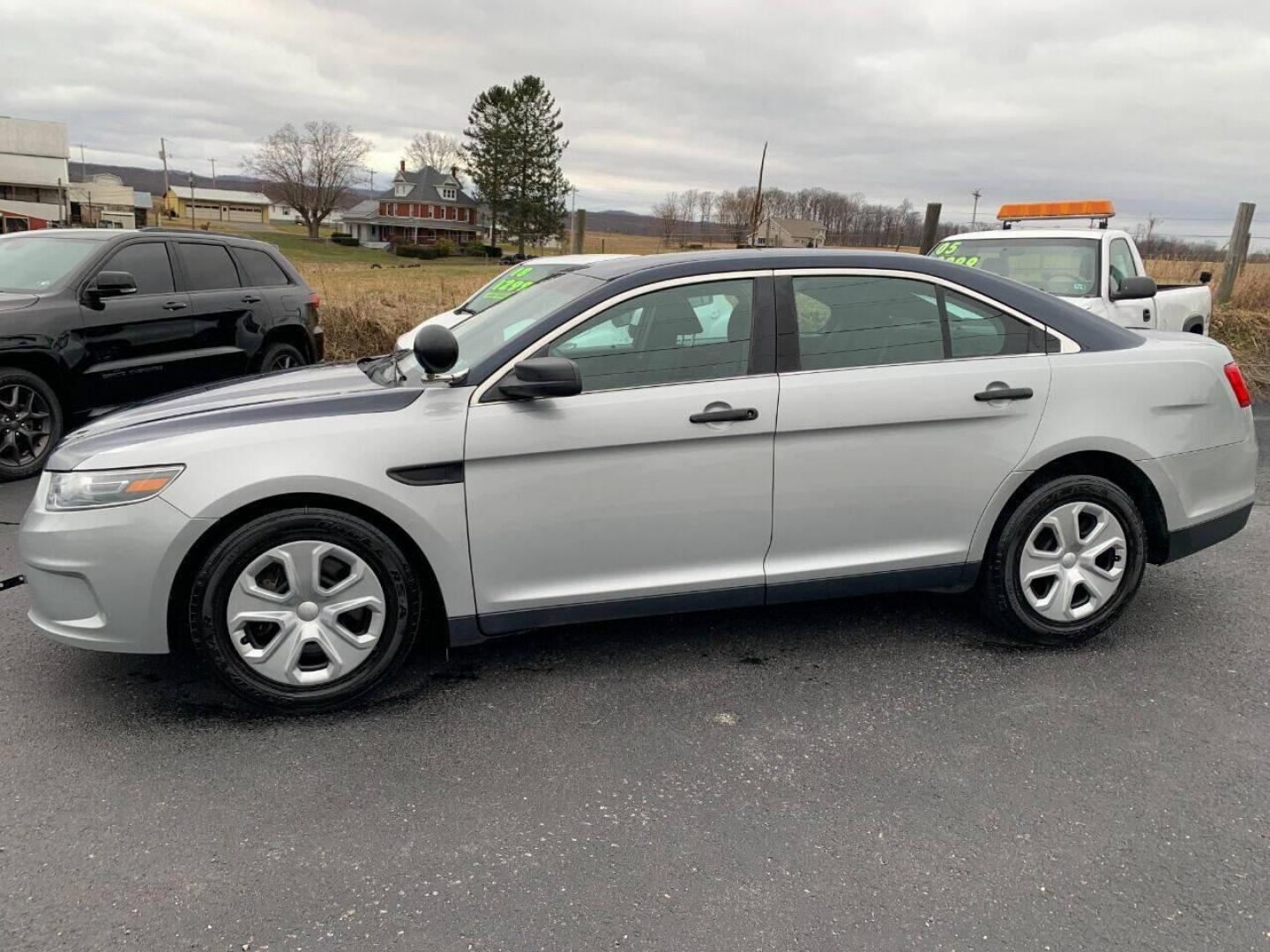 2015 Other Ford Taurus (1FAHP2MK9FG) with an 3.7L V6 3.7L V6 engine, located at 4845 Woodbury Pike, Roaring Springs, PA, (814) 317-5008, (814) 317-5008, 40.250935, -78.366959 - 2015 Ford Taurus Police Interceptor, AWD, automatic, 140k, power windows/locks, cruise/tilt wheel, air conditioning, rear back up. Southern car! Rust free, New inspection. This vehicle is a retired government vehicle, well maintained. To see a full list of this vehicles options visit smithfamily - Photo#0