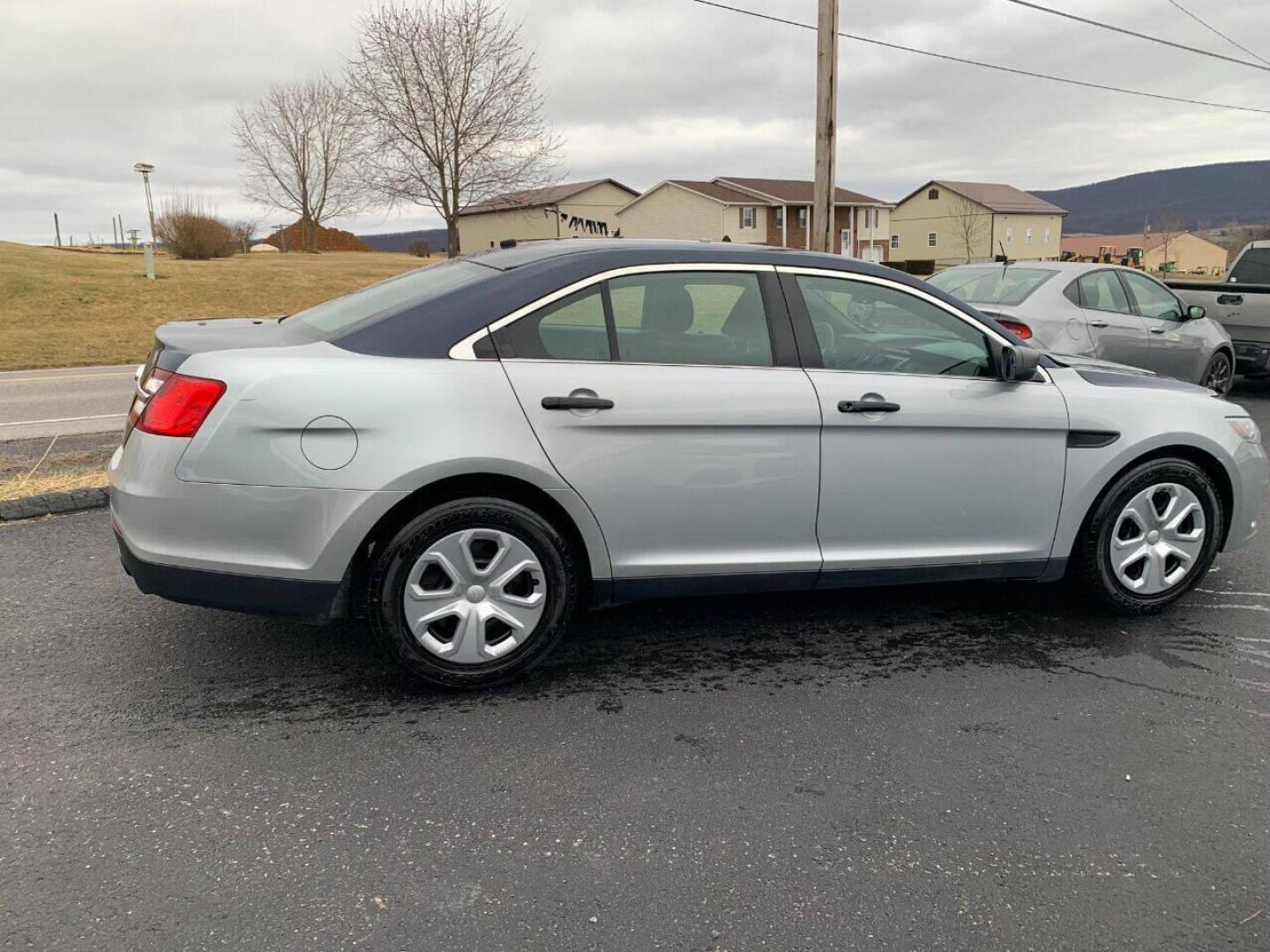 2015 Other Ford Taurus (1FAHP2MK9FG) with an 3.7L V6 3.7L V6 engine, located at 4845 Woodbury Pike, Roaring Springs, PA, (814) 317-5008, (814) 317-5008, 40.250935, -78.366959 - 2015 Ford Taurus Police Interceptor, AWD, automatic, 140k, power windows/locks, cruise/tilt wheel, air conditioning, rear back up. Southern car! Rust free, New inspection. This vehicle is a retired government vehicle, well maintained. To see a full list of this vehicles options visit smithfamily - Photo#1