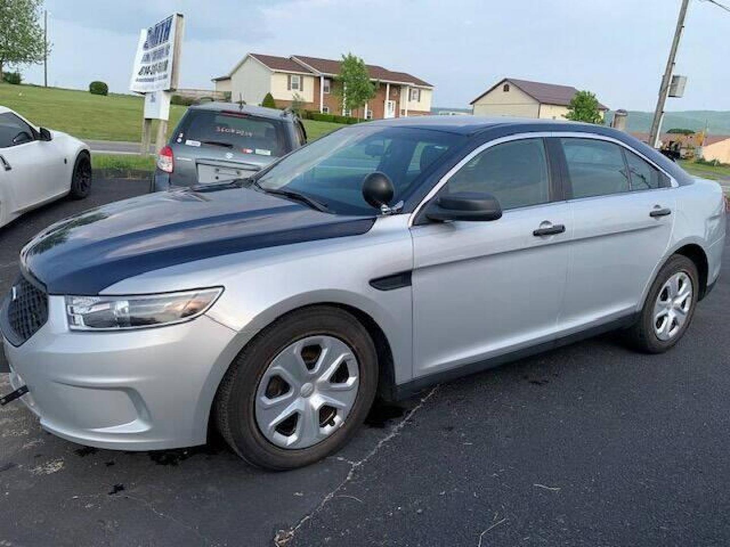 2016 Other Ford Taurus (1FAHP2MK7GG) with an 3.7L V6 3.7L V6 engine, located at 4845 Woodbury Pike, Roaring Springs, PA, (814) 317-5008, (814) 317-5008, 40.250935, -78.366959 - Photo#0