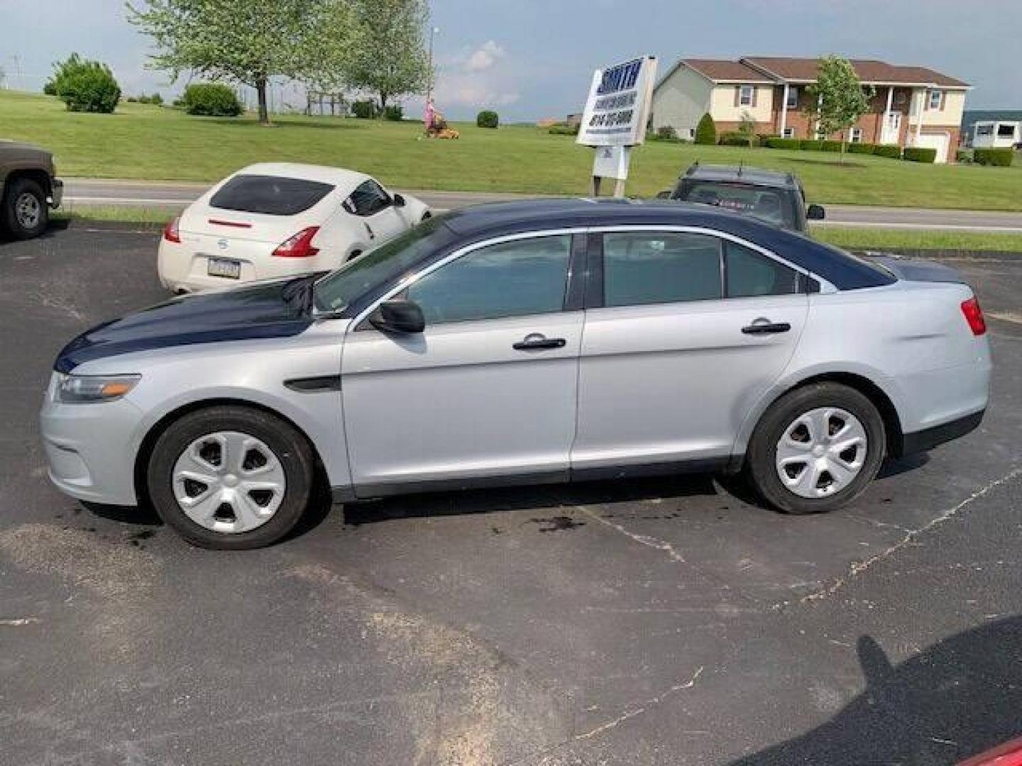 2016 Silver Ford Taurus (1FAHP2MK0GG) with an 3.7L V6 3.7L V6 engine, located at 4845 Woodbury Pike, Roaring Springs, PA, (814) 317-5008, (814) 317-5008, 40.250935, -78.366959 - 2016 Ford Taurus Police Sedan, automatic, AWD, 3.7L, V6, 123k, Southern vehicle, 1 owner, rear back up, like new tires, new inspection. Well maintained! If interested, please call 814-317-5008 or 814-497-4383. - Photo#1