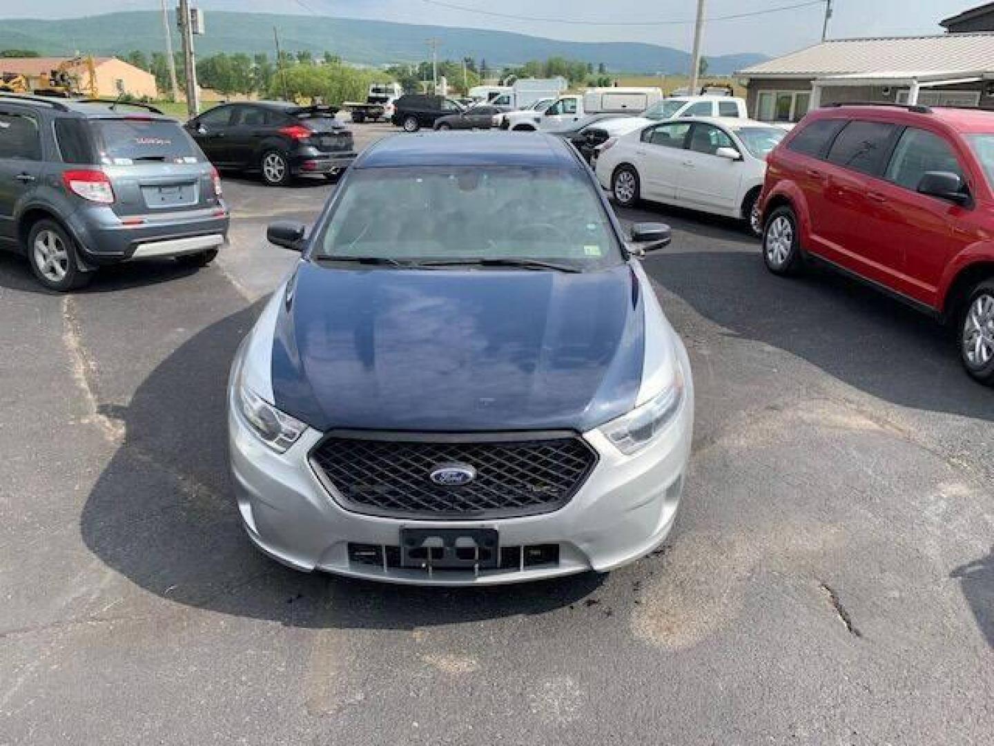 2016 Silver Ford Taurus (1FAHP2MK0GG) with an 3.7L V6 3.7L V6 engine, located at 4845 Woodbury Pike, Roaring Springs, PA, (814) 317-5008, (814) 317-5008, 40.250935, -78.366959 - 2016 Ford Taurus Police Sedan, automatic, AWD, 3.7L, V6, 123k, Southern vehicle, 1 owner, rear back up, like new tires, new inspection. Well maintained! If interested, please call 814-317-5008 or 814-497-4383. - Photo#2