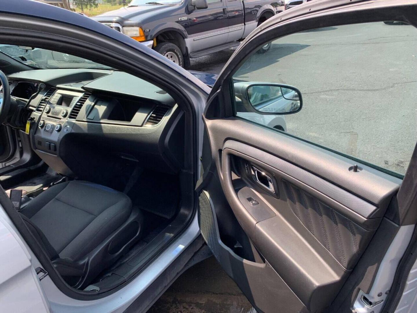 2016 Silver Ford Taurus (1FAHP2MKXGG) with an 3.7L V6 3.7L V6 engine, located at 4845 Woodbury Pike, Roaring Springs, PA, (814) 317-5008, (814) 317-5008, 40.250935, -78.366959 - Photo#12