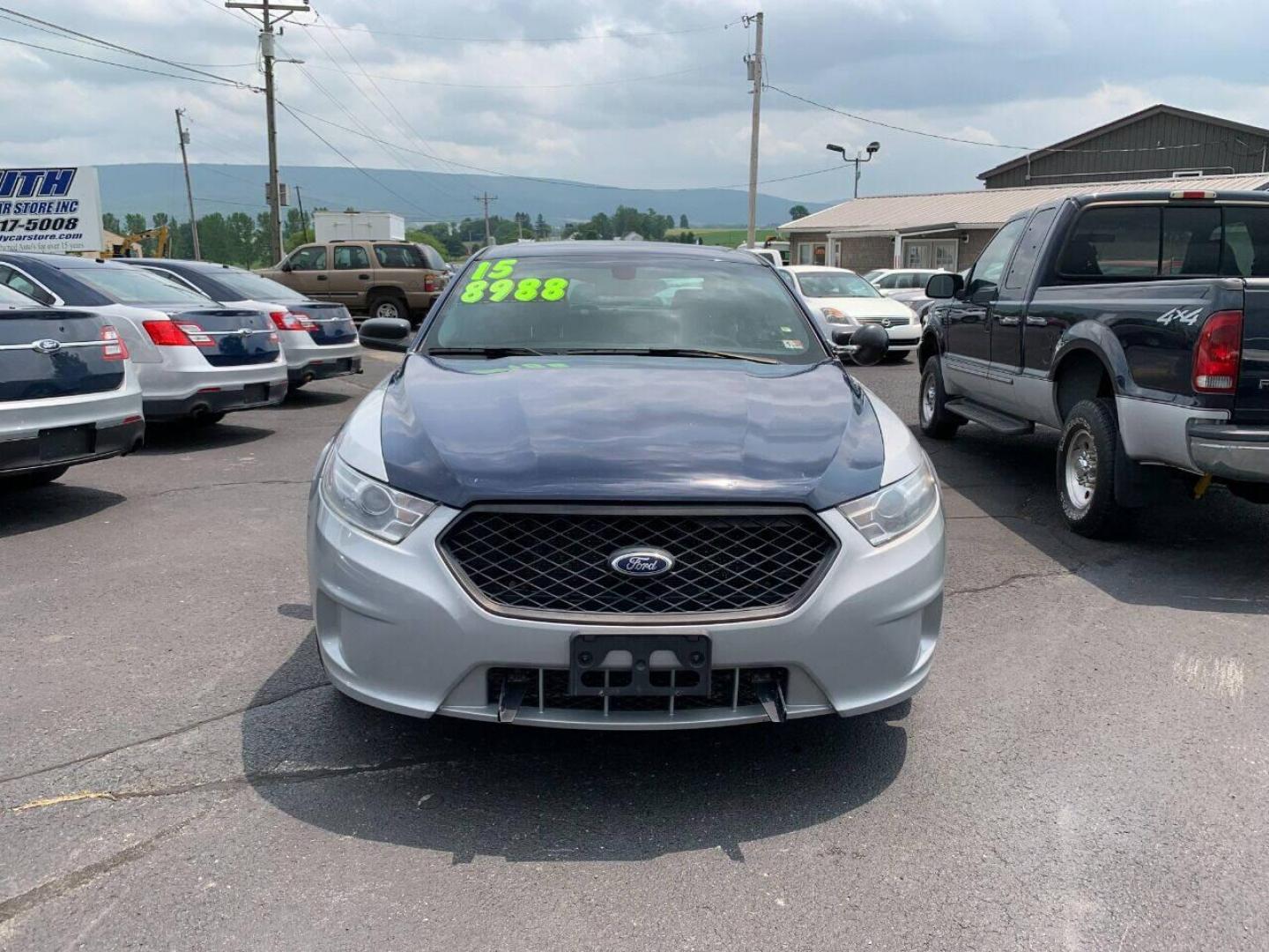 2015 Silver Ford Taurus (1FAHP2MK6FG) with an 3.7L V6 3.7L V6 engine, located at 4845 Woodbury Pike, Roaring Springs, PA, (814) 317-5008, (814) 317-5008, 40.250935, -78.366959 - Photo#2