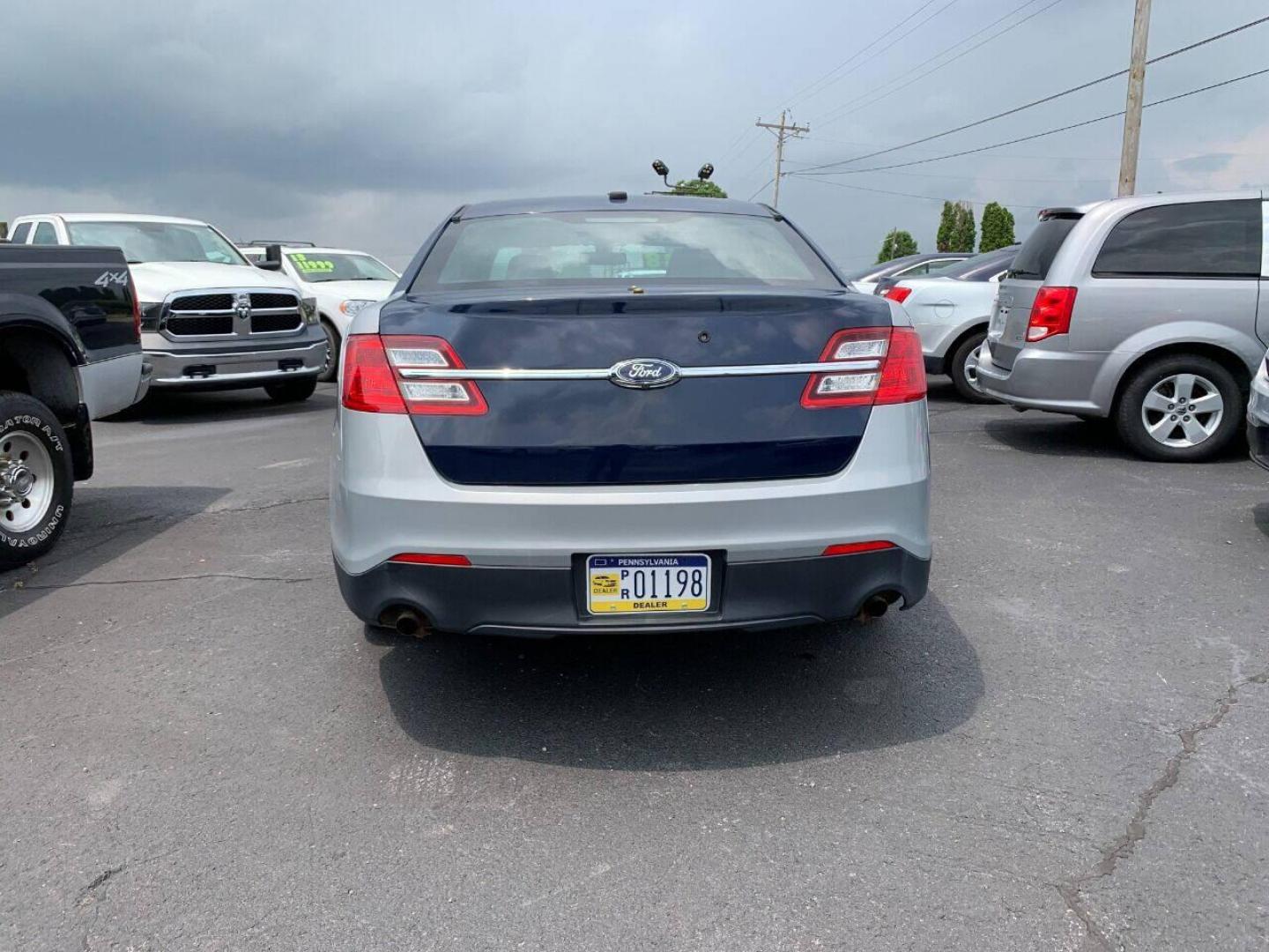 2015 Silver Ford Taurus (1FAHP2MK6FG) with an 3.7L V6 3.7L V6 engine, located at 4845 Woodbury Pike, Roaring Springs, PA, (814) 317-5008, (814) 317-5008, 40.250935, -78.366959 - Photo#3