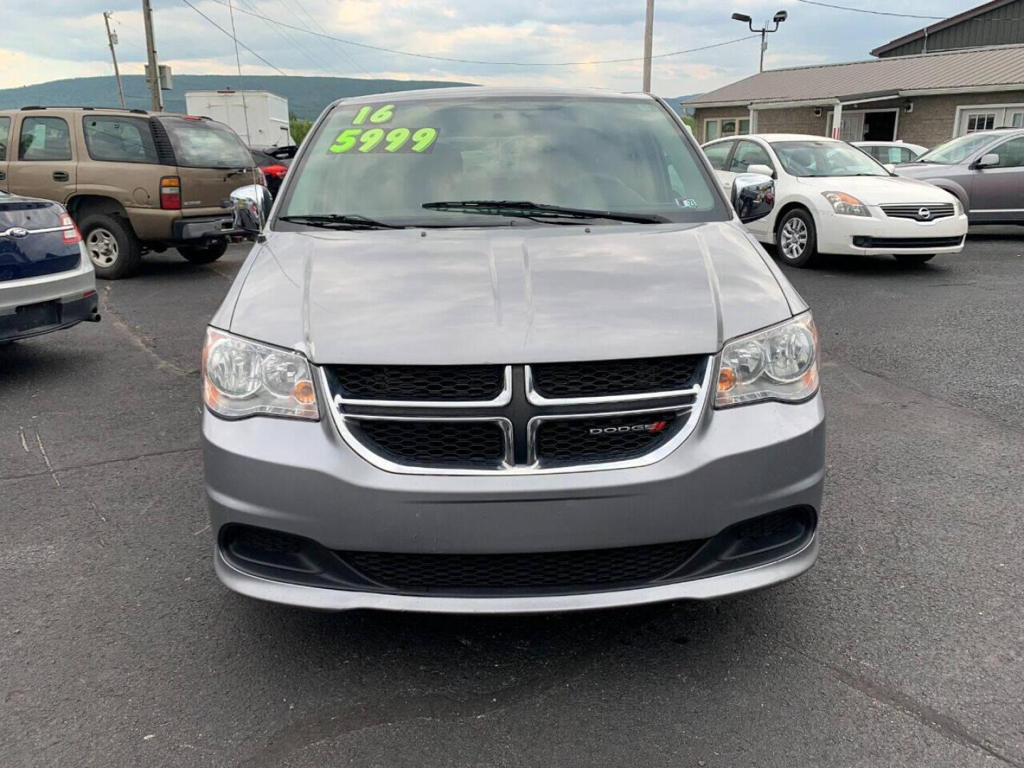 2016 Silver Dodge Grand Caravan (2C4RDGBG2GR) with an 3.6L V6 3.6L V6 engine, located at 4845 Woodbury Pike, Roaring Springs, PA, (814) 317-5008, (814) 317-5008, 40.250935, -78.366959 - 2016 Dodge Grand Caravan, 3.6L, V6, automatic, 3rd row, Flex Fuel, FWD, 188k, new tires, air conditioning and more. Vehicle has some deep scratches on driver rear side. If interested, please call 814-317-5008 or 814-497-4383. - Photo#2