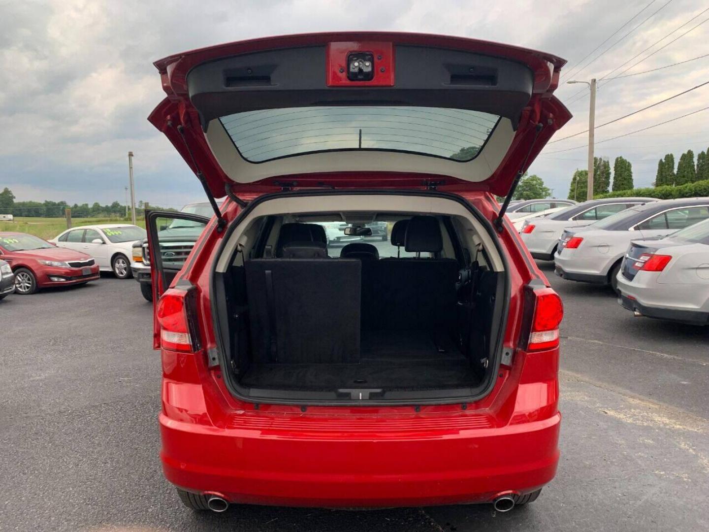 2018 Red Dodge Journey (3C4PDDAG6JT) with an 3.6L V6 3.6L V6 engine, located at 4845 Woodbury Pike, Roaring Springs, PA, (814) 317-5008, (814) 317-5008, 40.250935, -78.366959 - Photo#5