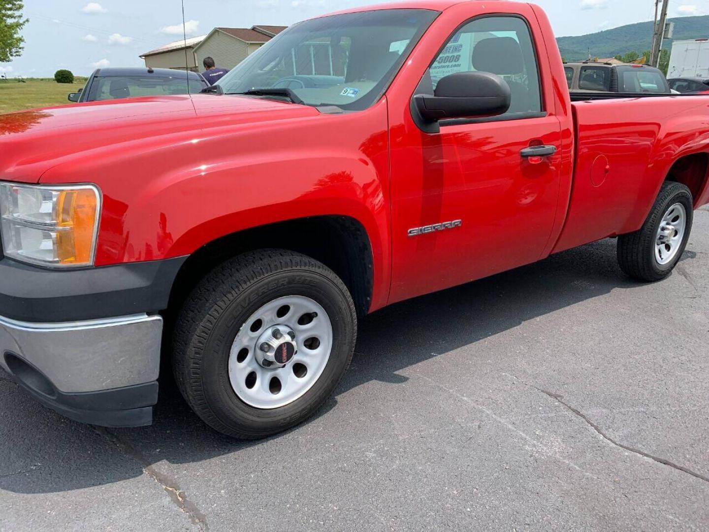 2013 Red GMC Sierra 1500 (1GTN1TEX1DZ) with an 4.3L V6 4.3L V6 engine, located at 4845 Woodbury Pike, Roaring Springs, PA, (814) 317-5008, (814) 317-5008, 40.250935, -78.366959 - Photo#0