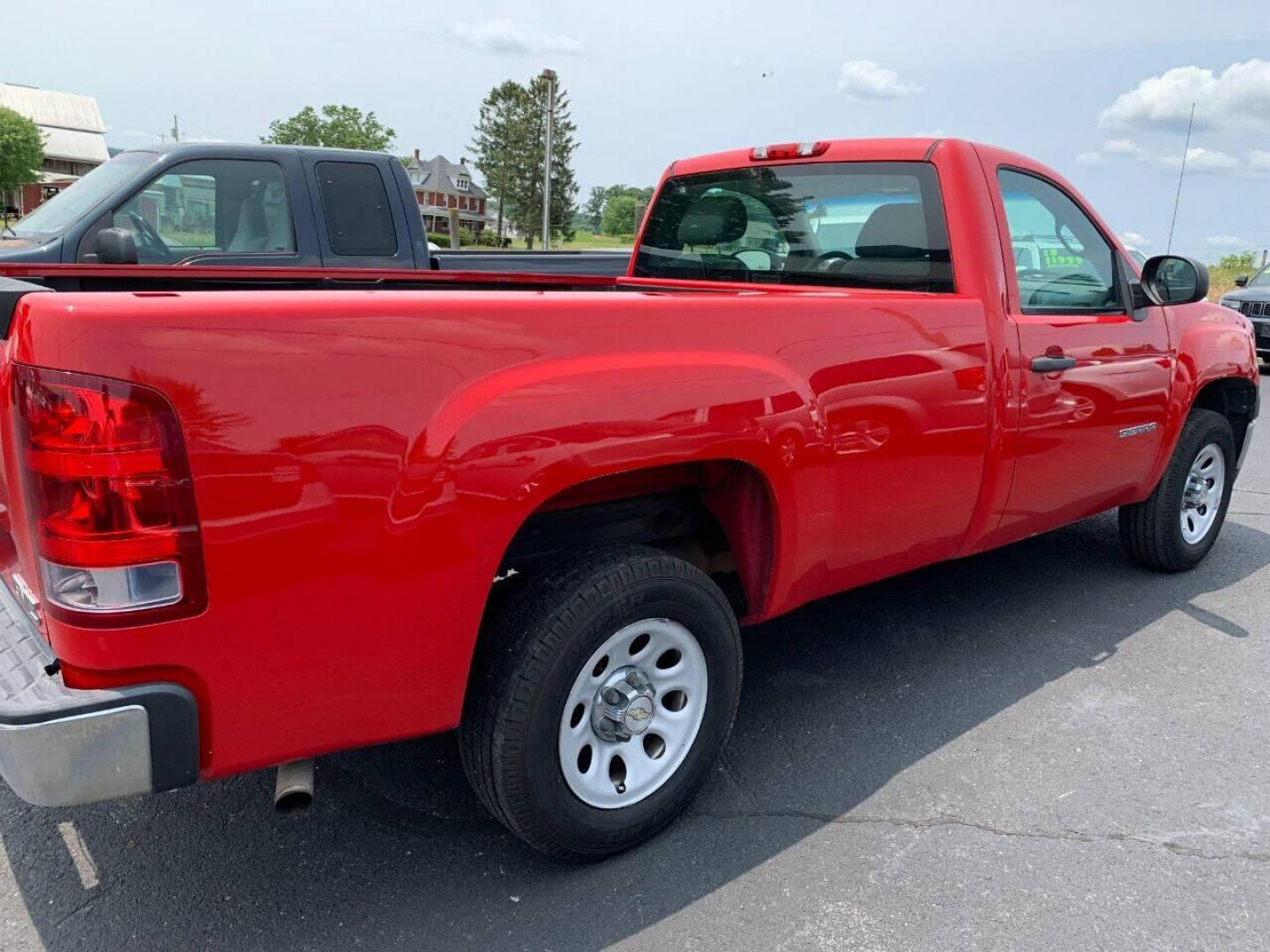 2013 Red GMC Sierra 1500 (1GTN1TEX1DZ) with an 4.3L V6 4.3L V6 engine, located at 4845 Woodbury Pike, Roaring Springs, PA, (814) 317-5008, (814) 317-5008, 40.250935, -78.366959 - Photo#1