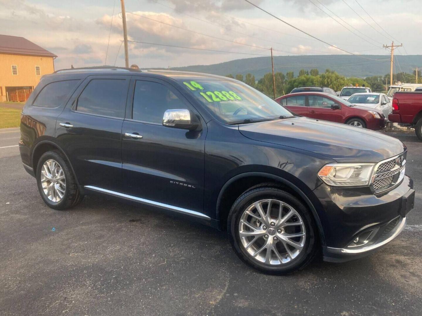 2014 Black Dodge Durango (1C4RDHEG2EC) with an 3.6L V6 3.6L V6 engine, located at 4845 Woodbury Pike, Roaring Springs, PA, (814) 317-5008, (814) 317-5008, 40.250935, -78.366959 - 2014 Dodge Durango, Citadel, Fully loaded, V6, automatic, 155k, 4x2, Navigation, DVD, sunroof, heated/air front and rear seats, 20 wheels, blind side detection, lane departure, automatic wipers and so much more. This vehicle is a must see! Clean, Mint condition! Will come with a 3 month/3000 mile - Photo#1