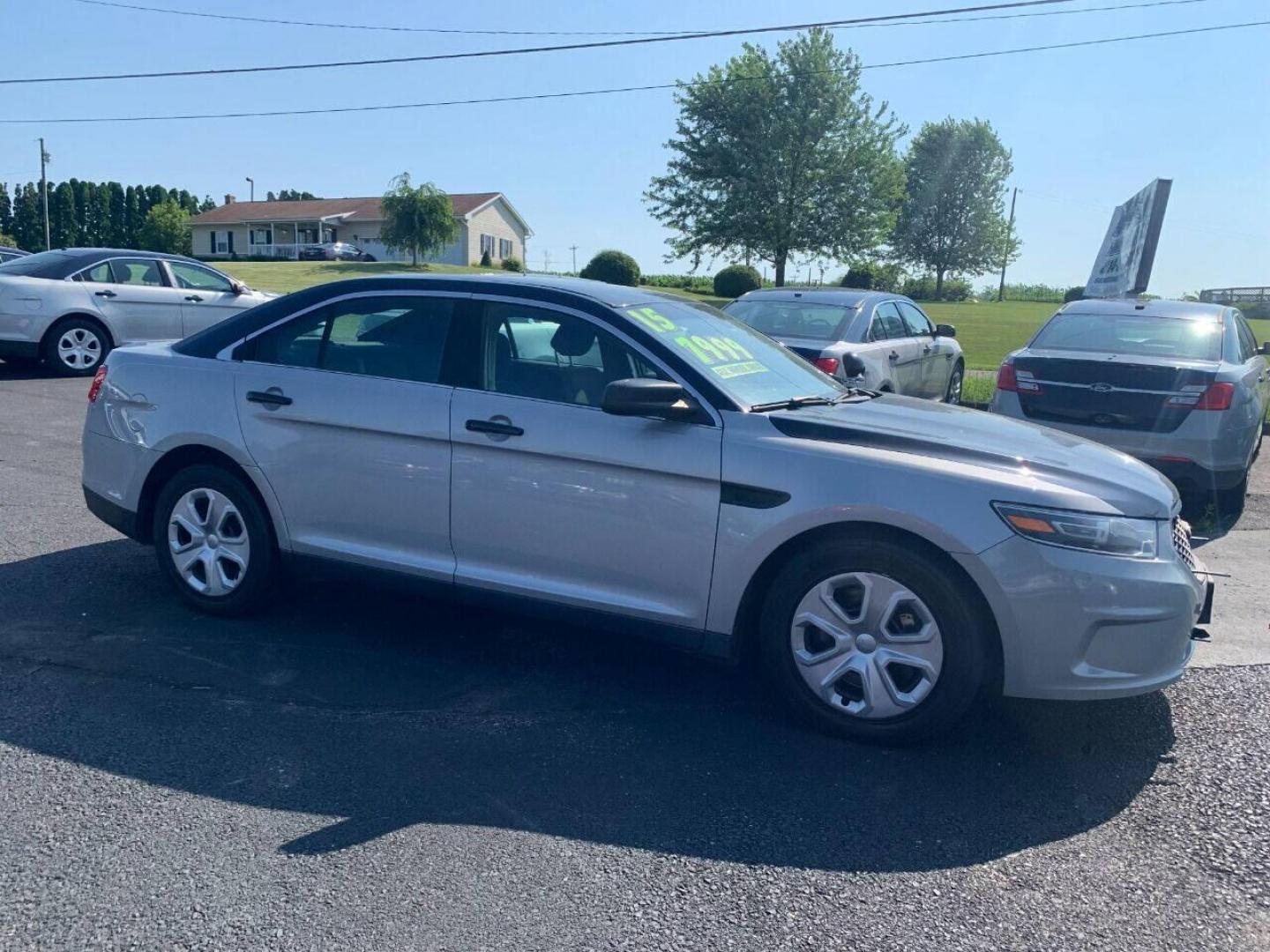 2015 Other Ford Taurus (1FAHP2MK5FG) with an 3.7L V6 3.7L V6 engine, located at 4845 Woodbury Pike, Roaring Springs, PA, (814) 317-5008, (814) 317-5008, 40.250935, -78.366959 - 2015 Ford Taurus Police Sedan, AWD, 135k, 3.7L, V6, power windows/locks, cruise/tilt wheel, air conditioning, steering controls, Flex fuel, rear back up, well maintained, new inspection and more. Southern retired government vehicle. To see a full list of this vehicles options visit smithfamilycarsto - Photo#0