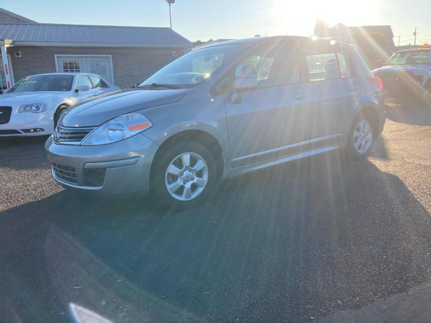 2011 Pewter Nissan Versa (3N1BC1CP5BL) with an 1.8L I4 1.8L I4 engine, located at 4845 Woodbury Pike, Roaring Springs, PA, (814) 317-5008, (814) 317-5008, 40.250935, -78.366959 - Photo#2