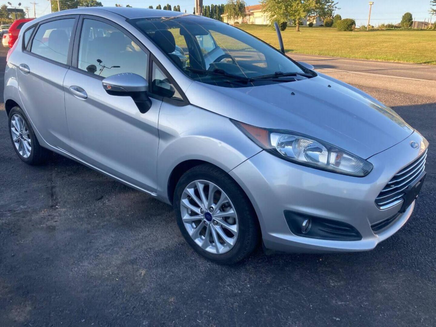 2014 Silver Ford Fiesta (3FADP4EJXEM) with an 1.6L I4 1.6L I4 engine, located at 4845 Woodbury Pike, Roaring Springs, PA, (814) 317-5008, (814) 317-5008, 40.250935, -78.366959 - 2014 Ford Fiesta SE, automatic, FWD, 79k, 4 cylinder, loaded, navigation, aluminum wheels, hatchback, fog lights, Siri, factory upgraded lighting interior and much more! Southern vehicle! New inspection! Runs 100%. If interested, please call 814-317-5008 or 814-497-4383. - Photo#0