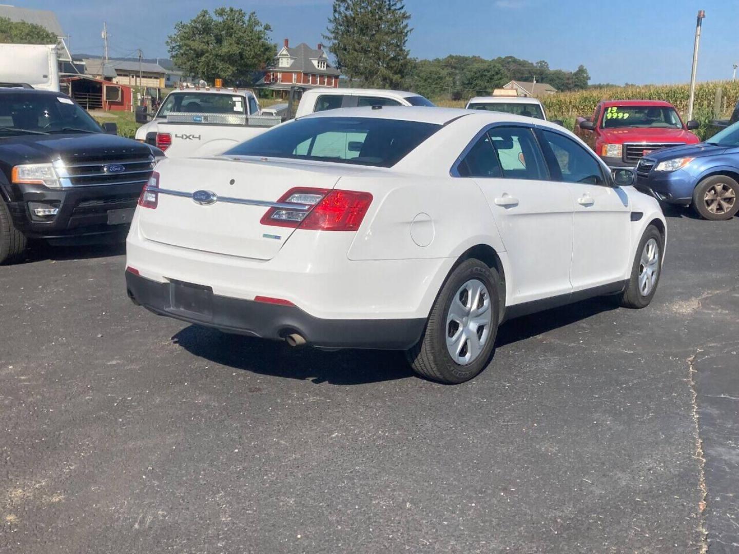 2018 White Ford Taurus (1FAHP2MK7JG) with an 3.7L V6 3.7L V6 engine, located at 4845 Woodbury Pike, Roaring Springs, PA, (814) 317-5008, (814) 317-5008, 40.250935, -78.366959 - 1 Owner! 2018 Ford Taurus Police Interceptor, 126k, AWD, 3.7L, V6, Flex fuel, Southern car! Like new tires! New inspection! Super clean ready to go! This vehicle did not have cage or any rear modifications, power windows/locks, cruise/tilt wheel, air conditioning, rear back up. If interested, ple - Photo#2