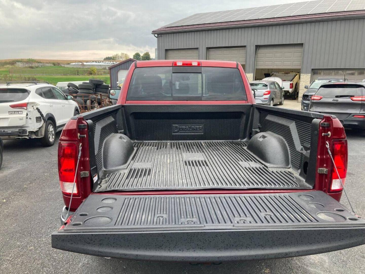 2013 Burgundy RAM 1500 (3C6JR7AT5DG) with an 5.7L V8 5.7L V8 engine, located at 4845 Woodbury Pike, Roaring Springs, PA, (814) 317-5008, (814) 317-5008, 40.250935, -78.366959 - Photo#1