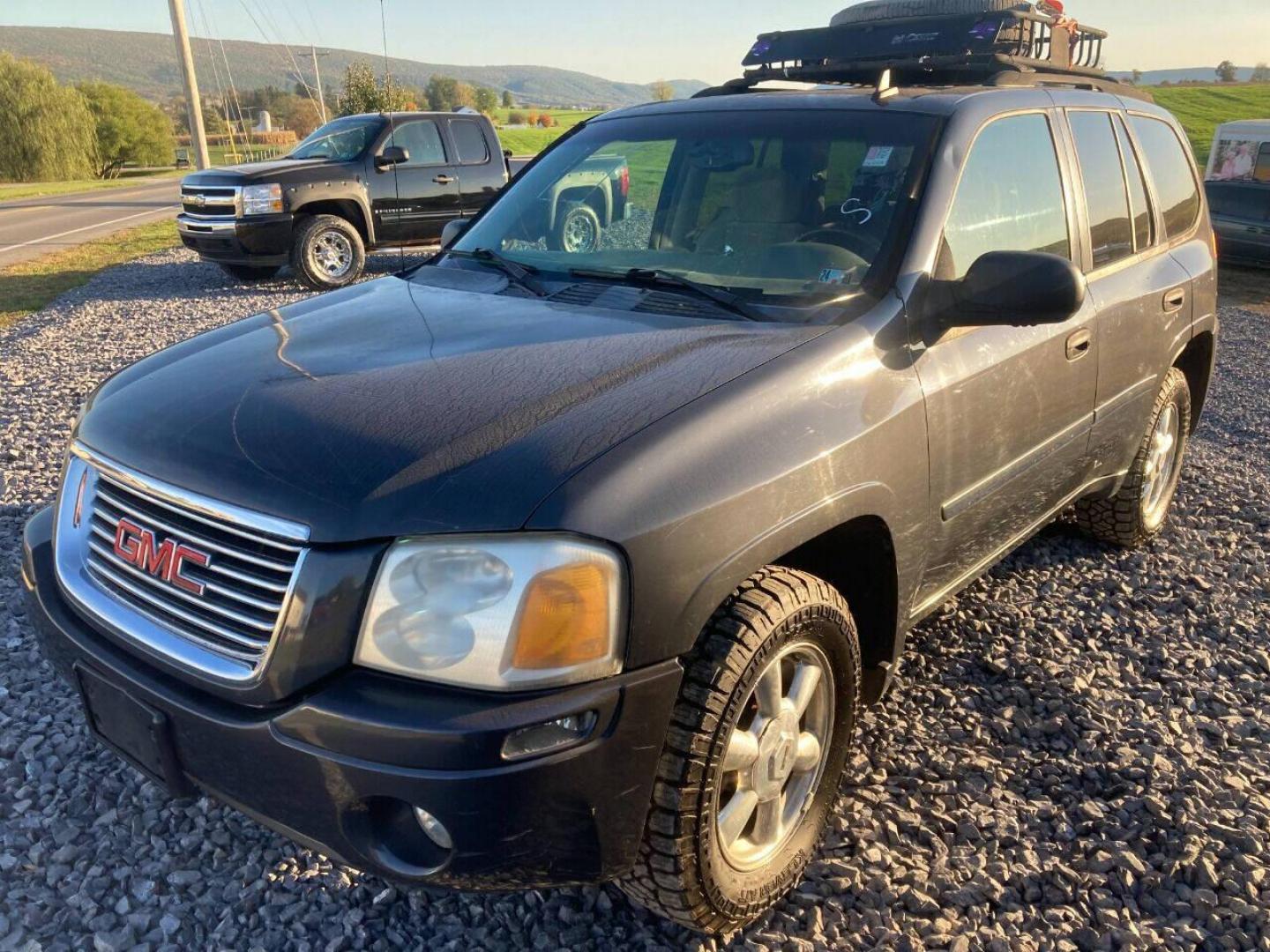 2007 Black GMC Envoy (1GKDT13S172) with an 4.2L I6 4.2L I6 engine, located at 4845 Woodbury Pike, Roaring Springs, PA, (814) 317-5008, (814) 317-5008, 40.250935, -78.366959 - 2007 GMC Envoy, 220k, automatic, 4x4, new tires, new inspection. Southern vehicle! Beautiful undercarriage! Rust free frame! Body is in excellent condition! Runs and drives 100%! If interested, please call 814-317-5008 or 814-497-4383. - Photo#0