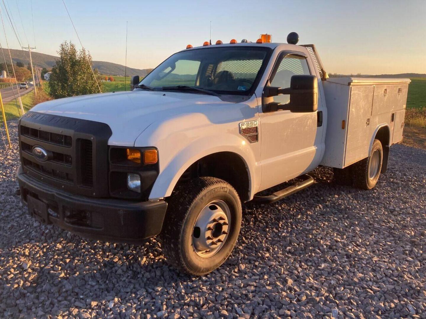 2008 White Ford F-350 Super Duty (1FDWF37R68E) with an 6.4L V8 Twin Turbo 6.4L V8 engine, located at 4845 Woodbury Pike, Roaring Springs, PA, (814) 317-5008, (814) 317-5008, 40.250935, -78.366959 - 2009 Ford F-350, 170k, diesel, 6 speed manual, air conditioning, 4x4. Truck is super clean! Southern vehicle! Rust free cab and undercarriage. Paint still on the frame. Truck was very well maintained! Super clean inside! If interested, please call 814-317-5008 or 814-497-4383. - Photo#0