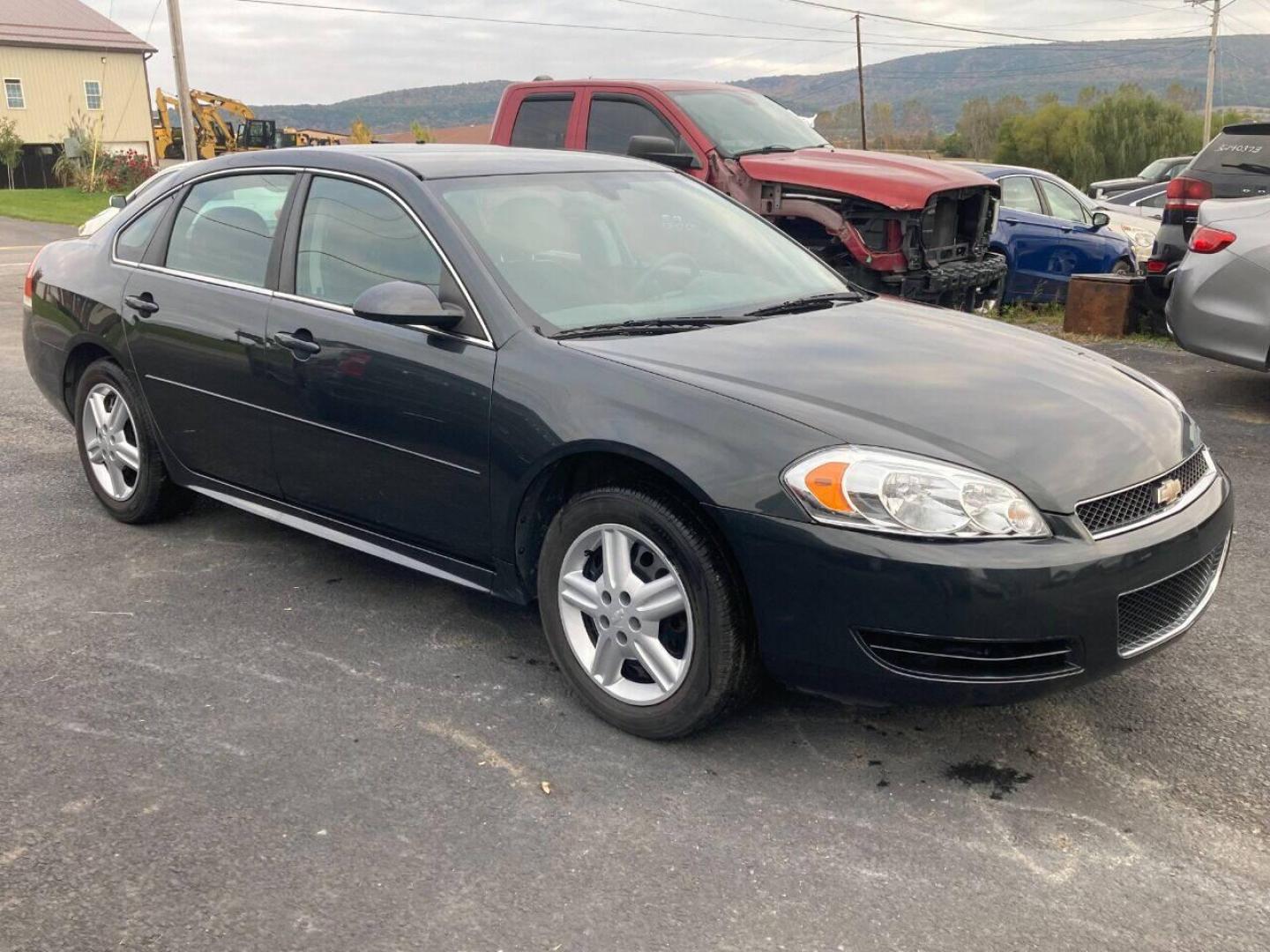 2013 Black Chevrolet Impala (2G1WD5E3XD1) with an 3.6L V6 3.6L V6 engine, located at 4845 Woodbury Pike, Roaring Springs, PA, (814) 317-5008, (814) 317-5008, 40.250935, -78.366959 - Photo#0