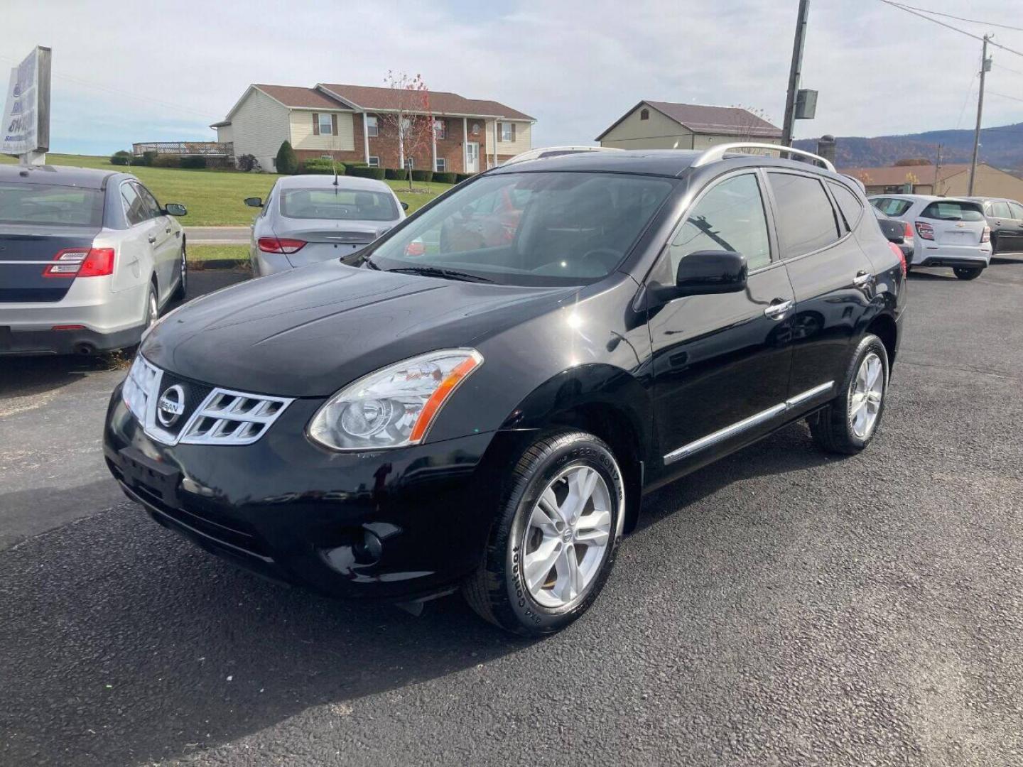 2013 Black Nissan Rogue (JN8AS5MVXDW) with an 2.5L I4 2.5L I4 engine, located at 4845 Woodbury Pike, Roaring Springs, PA, (814) 317-5008, (814) 317-5008, 40.250935, -78.366959 - 2013 Nissan Rogue SV, automatic, AWD, 77k, power windows/locks, cruise/tilt wheel, Navigation, rear back up camera, roof, new inspection, like new tires and much more. Rust free! Must see condition! Only being sold so cheap due to having a Reconstructed title. Vehicle had storm damage five years - Photo#0