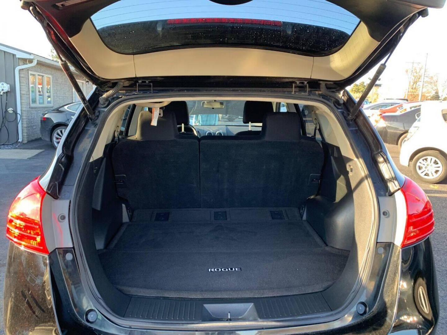 2013 Black Nissan Rogue (JN8AS5MVXDW) with an 2.5L I4 2.5L I4 engine, located at 4845 Woodbury Pike, Roaring Springs, PA, (814) 317-5008, (814) 317-5008, 40.250935, -78.366959 - 2013 Nissan Rogue SV, automatic, AWD, 77k, power windows/locks, cruise/tilt wheel, Navigation, rear back up camera, roof, new inspection, like new tires and much more. Rust free! Must see condition! Only being sold so cheap due to having a Reconstructed title. Vehicle had storm damage five years - Photo#8