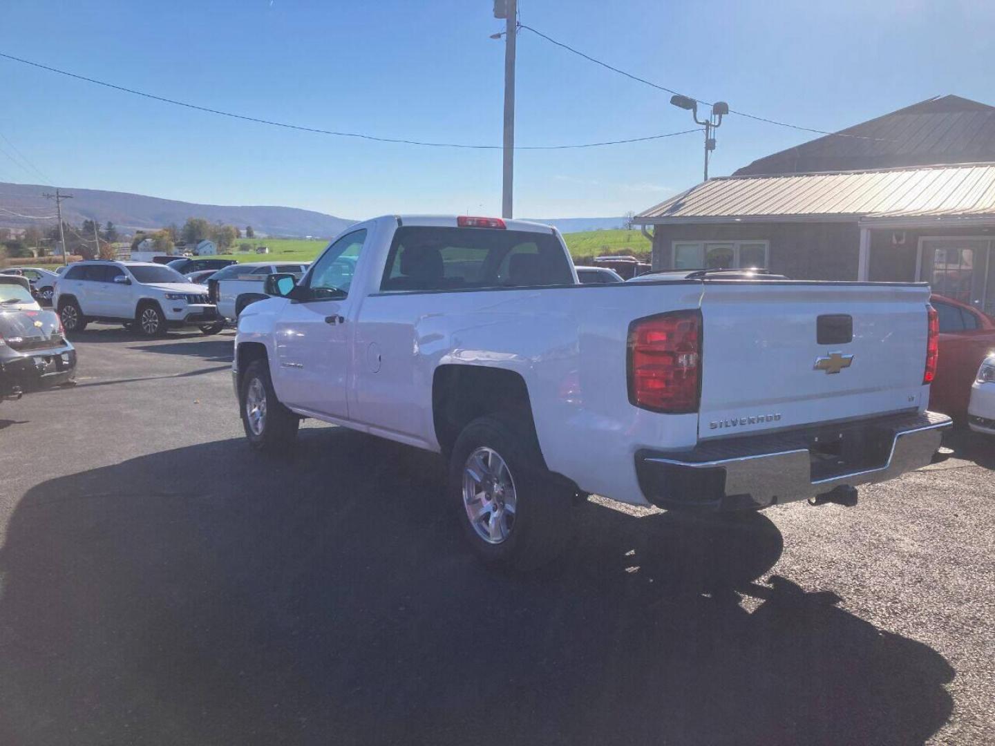 2014 White Chevrolet Silverado 1500 (1GCNCREC8EZ) with an 5.3L V8 5.3L V8 engine, located at 4845 Woodbury Pike, Roaring Springs, PA, (814) 317-5008, (814) 317-5008, 40.250935, -78.366959 - Photo#2