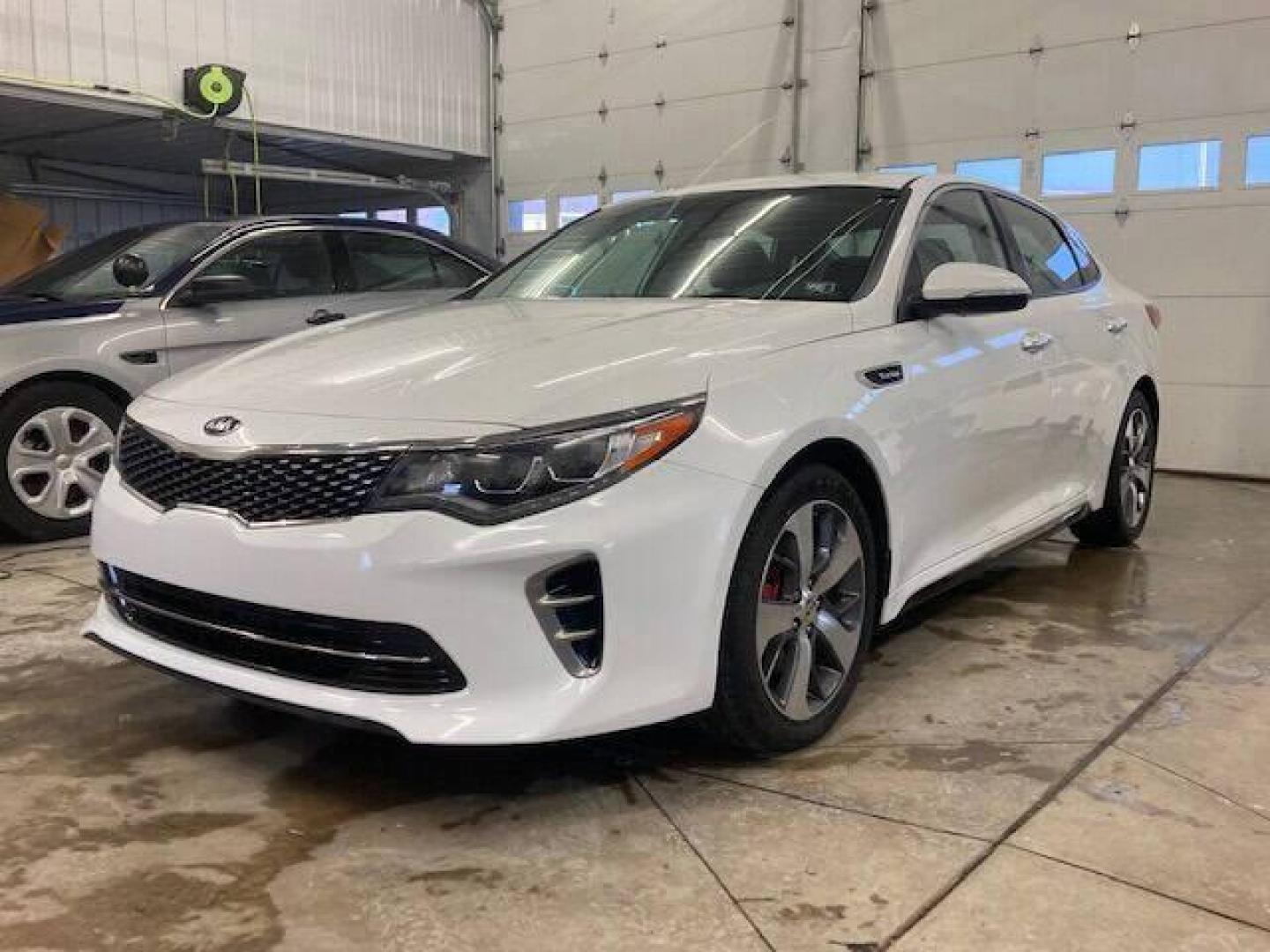 2017 White Kia Optima (5XXGW4L28HG) with an 2.0L I4 Turbocharger 2.0L I4 engine, located at 4845 Woodbury Pike, Roaring Springs, PA, (814) 317-5008, (814) 317-5008, 40.250935, -78.366959 - Photo#0