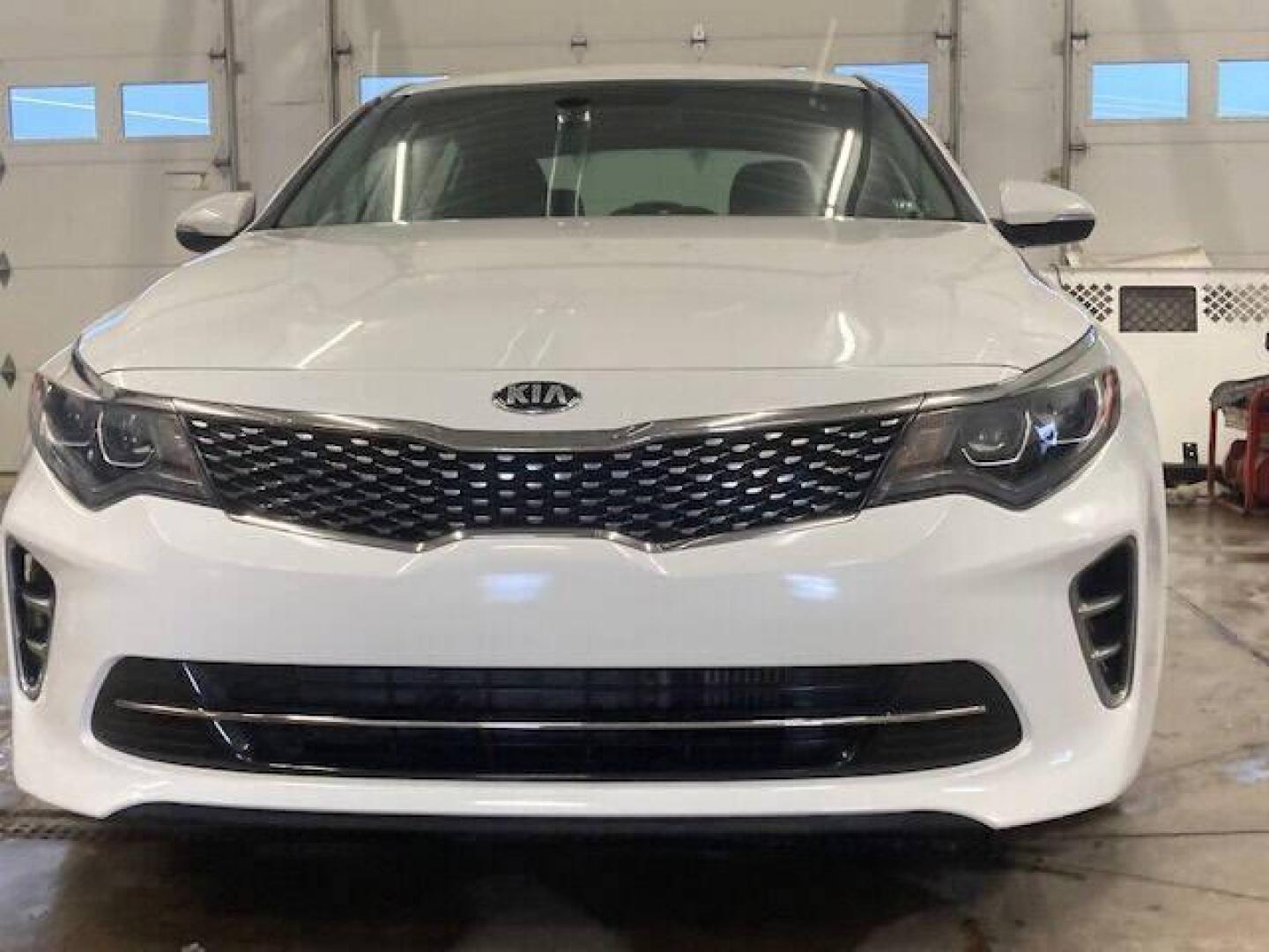 2017 White Kia Optima (5XXGW4L28HG) with an 2.0L I4 Turbocharger 2.0L I4 engine, located at 4845 Woodbury Pike, Roaring Springs, PA, (814) 317-5008, (814) 317-5008, 40.250935, -78.366959 - Photo#5