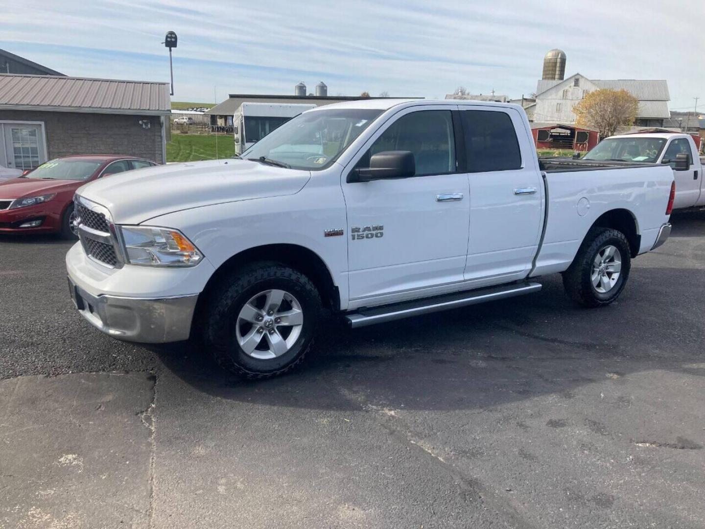 2014 White RAM 1500 (1C6RR7GT8ES) with an 5.7L V8 5.7L V8 engine, located at 4845 Woodbury Pike, Roaring Springs, PA, (814) 317-5008, (814) 317-5008, 40.250935, -78.366959 - 2014 Dodge Ram 1500, Quad cab, SLT, 5.7 Hemi, 4x4, 189k, aluminum wheels/running boards, rear back up camera, factory trailer brake, trip trailer package, power seat, flip up center console, new inspection. Truck is serviced and ready to go! Southern truck! Well maintained! Will come with a warr - Photo#0