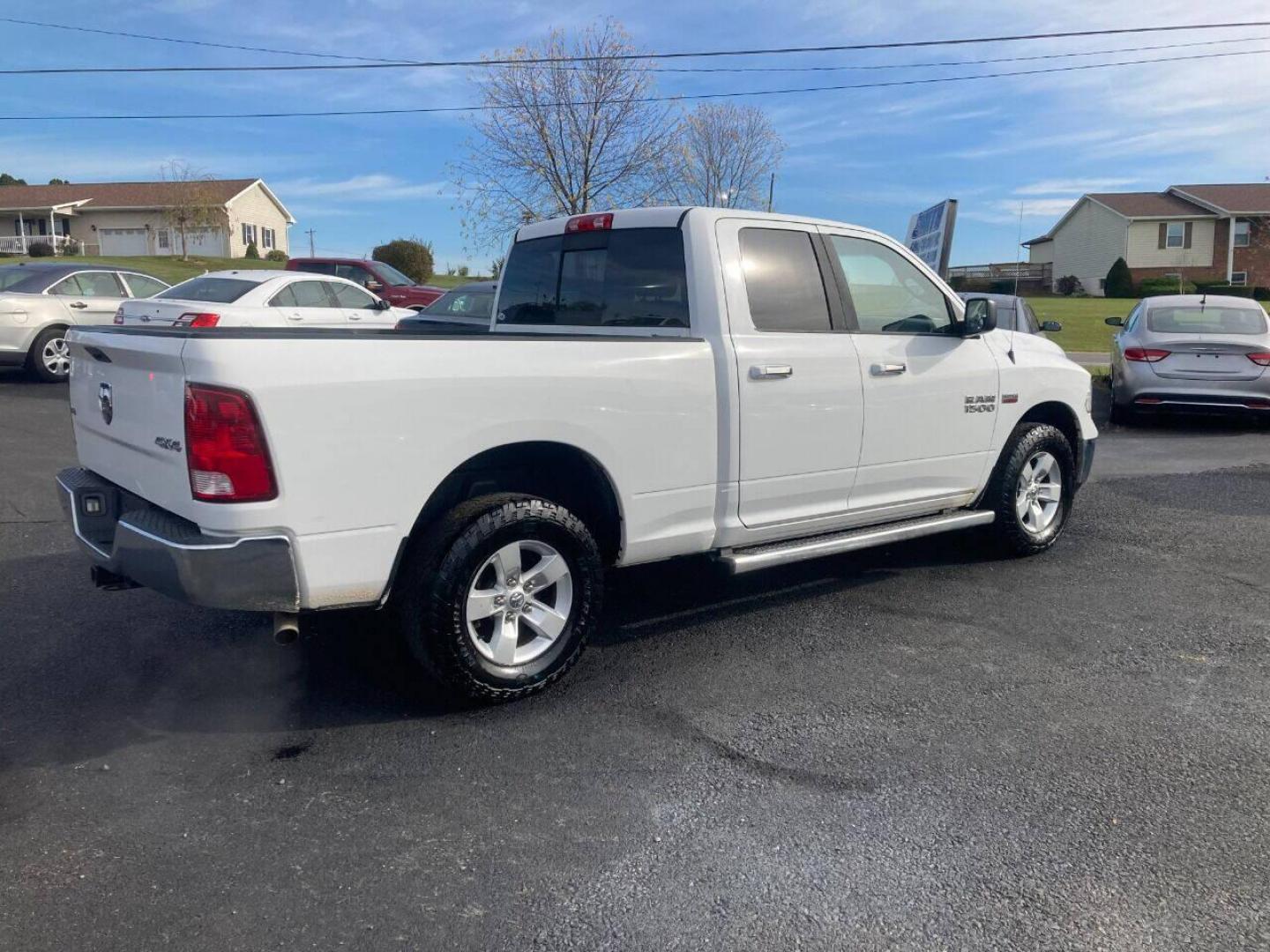 2014 White RAM 1500 (1C6RR7GT8ES) with an 5.7L V8 5.7L V8 engine, located at 4845 Woodbury Pike, Roaring Springs, PA, (814) 317-5008, (814) 317-5008, 40.250935, -78.366959 - 2014 Dodge Ram 1500, Quad cab, SLT, 5.7 Hemi, 4x4, 189k, aluminum wheels/running boards, rear back up camera, factory trailer brake, trip trailer package, power seat, flip up center console, new inspection. Truck is serviced and ready to go! Southern truck! Well maintained! Will come with a warr - Photo#3