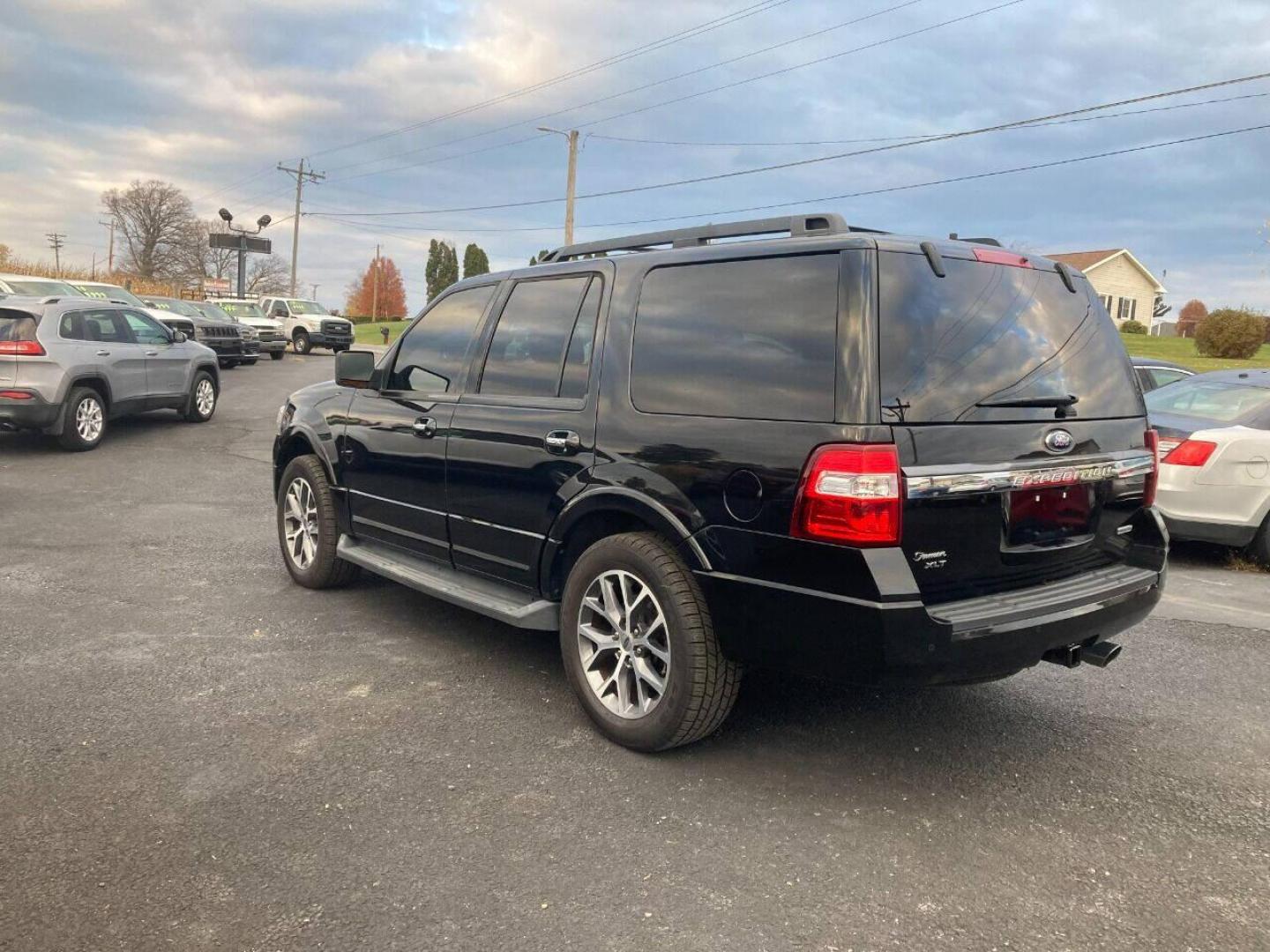 2015 Black Ford Expedition (1FMJU1HT7FE) with an 3.5L V6 Twin Turbocharger 3.5L V6 engine, located at 4845 Woodbury Pike, Roaring Springs, PA, (814) 317-5008, (814) 317-5008, 40.250935, -78.366959 - 2015 Ford Expedition XLT, automatic, 3.5L, eco-boost, leather, 3rd row, Sony sound system, Navigation, heated and a/c seats, rear back up, power seats, power locks, new tires, new inspection, factory trailer brake, 4x2, tow package, locking rear differential and so much more. Southern vehicle! Rus - Photo#2