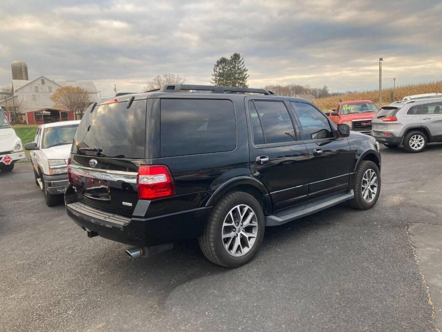 2015 Black Ford Expedition (1FMJU1HT7FE) with an 3.5L V6 Twin Turbocharger 3.5L V6 engine, located at 4845 Woodbury Pike, Roaring Springs, PA, (814) 317-5008, (814) 317-5008, 40.250935, -78.366959 - 2015 Ford Expedition XLT, automatic, 3.5L, eco-boost, leather, 3rd row, Sony sound system, Navigation, heated and a/c seats, rear back up, power seats, power locks, new tires, new inspection, factory trailer brake, 4x2, tow package, locking rear differential and so much more. Southern vehicle! Rus - Photo#3