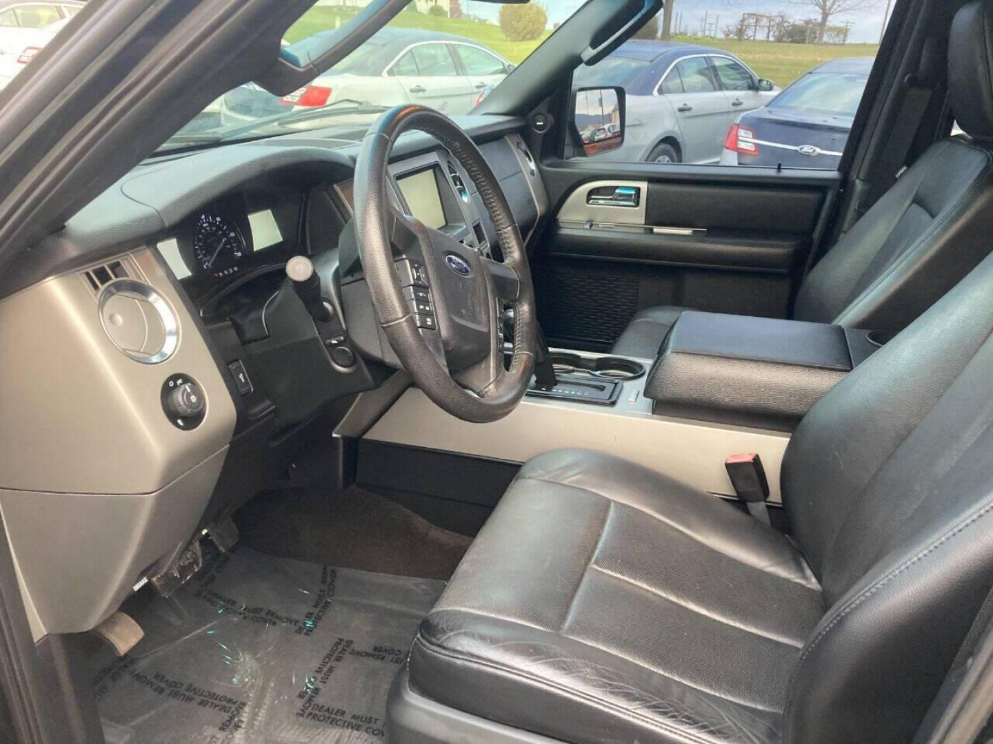 2015 Black Ford Expedition (1FMJU1HT7FE) with an 3.5L V6 Twin Turbocharger 3.5L V6 engine, located at 4845 Woodbury Pike, Roaring Springs, PA, (814) 317-5008, (814) 317-5008, 40.250935, -78.366959 - 2015 Ford Expedition XLT, automatic, 3.5L, eco-boost, leather, 3rd row, Sony sound system, Navigation, heated and a/c seats, rear back up, power seats, power locks, new tires, new inspection, factory trailer brake, 4x2, tow package, locking rear differential and so much more. Southern vehicle! Rus - Photo#5