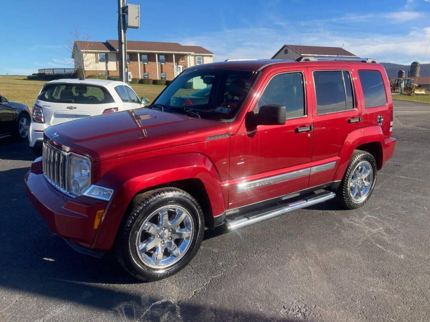 2011 Burgundy Jeep Liberty (1J4PN5GK1BW) with an 3.7L V6 3.7L V6 engine, located at 4845 Woodbury Pike, Roaring Springs, PA, (814) 317-5008, (814) 317-5008, 40.250935, -78.366959 - Photo#0