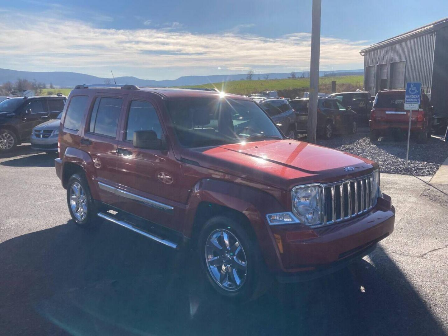 2011 Burgundy Jeep Liberty (1J4PN5GK1BW) with an 3.7L V6 3.7L V6 engine, located at 4845 Woodbury Pike, Roaring Springs, PA, (814) 317-5008, (814) 317-5008, 40.250935, -78.366959 - Photo#1