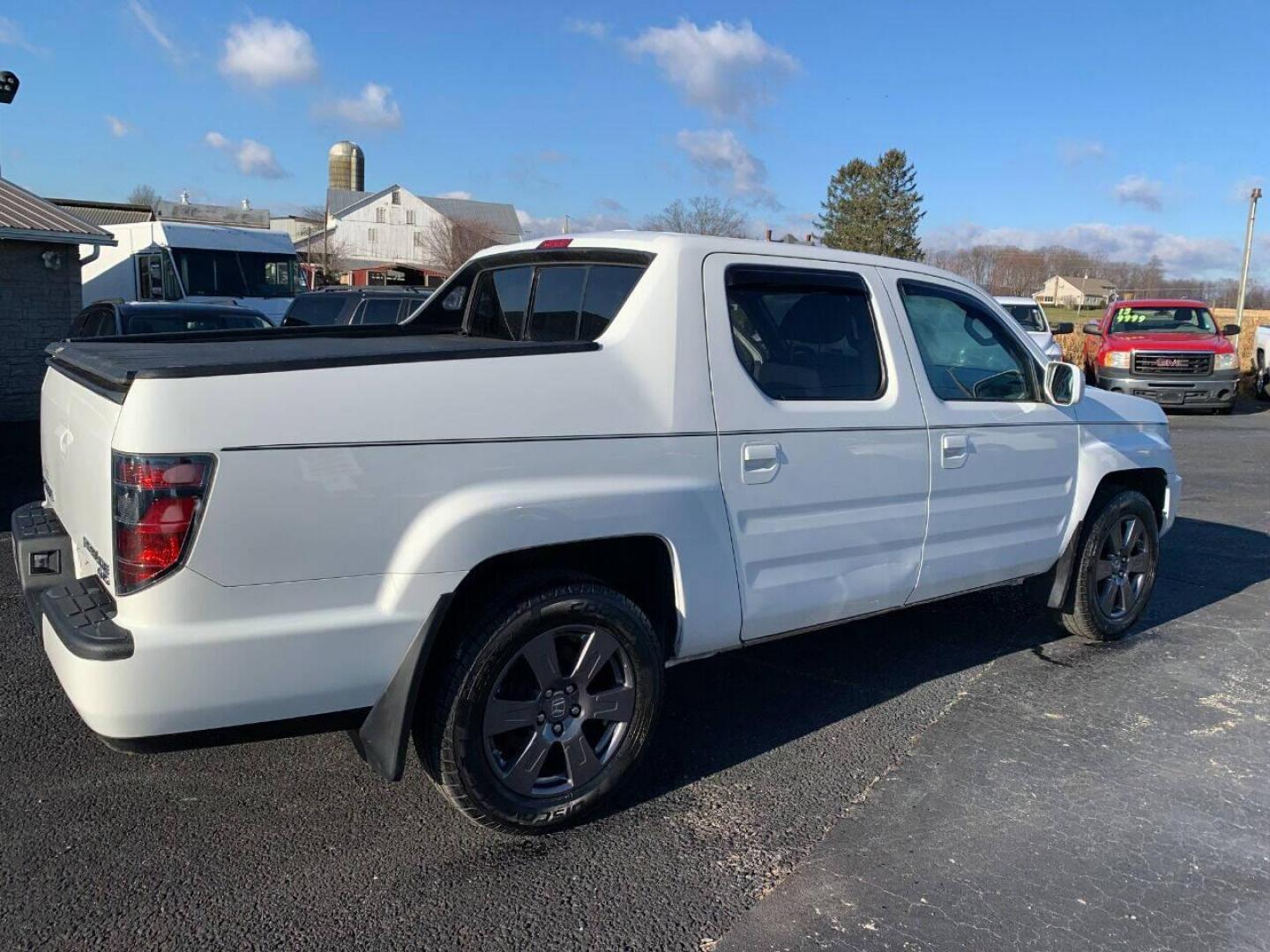 2014 White Honda Ridgeline (5FPYK1F54EB) with an 3.5L V6 3.5L V6 engine, located at 4845 Woodbury Pike, Roaring Springs, PA, (814) 317-5008, (814) 317-5008, 40.250935, -78.366959 - Photo#1