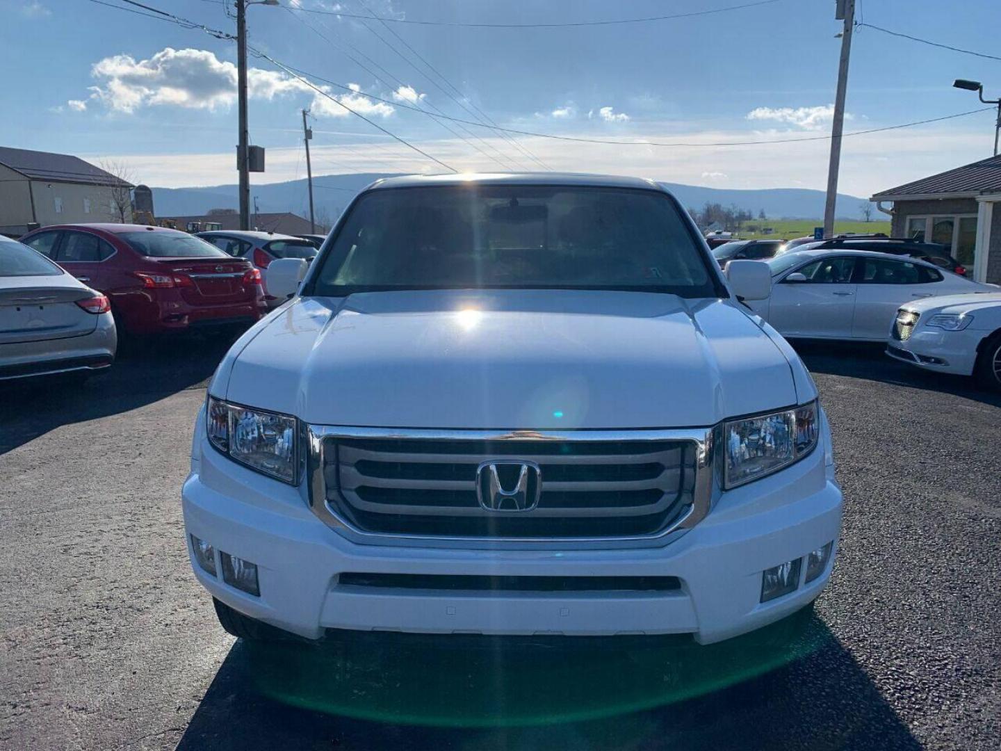 2014 White Honda Ridgeline (5FPYK1F54EB) with an 3.5L V6 3.5L V6 engine, located at 4845 Woodbury Pike, Roaring Springs, PA, (814) 317-5008, (814) 317-5008, 40.250935, -78.366959 - Photo#2